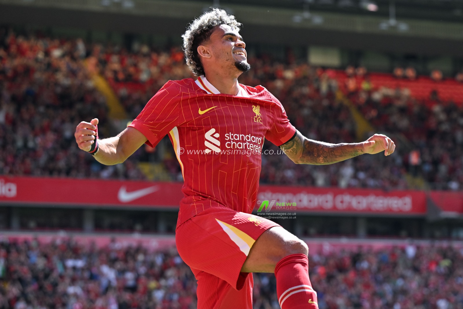 Luis DÃ­az of Liverpool celebrates his goal to make it 3-0 Liverpool during the Pre-season friendly match Liverpool vs Sevilla at Anfield, Liverpool, United Kingdom, 11th August 2024

(Photo by Cody Froggatt/News Images)