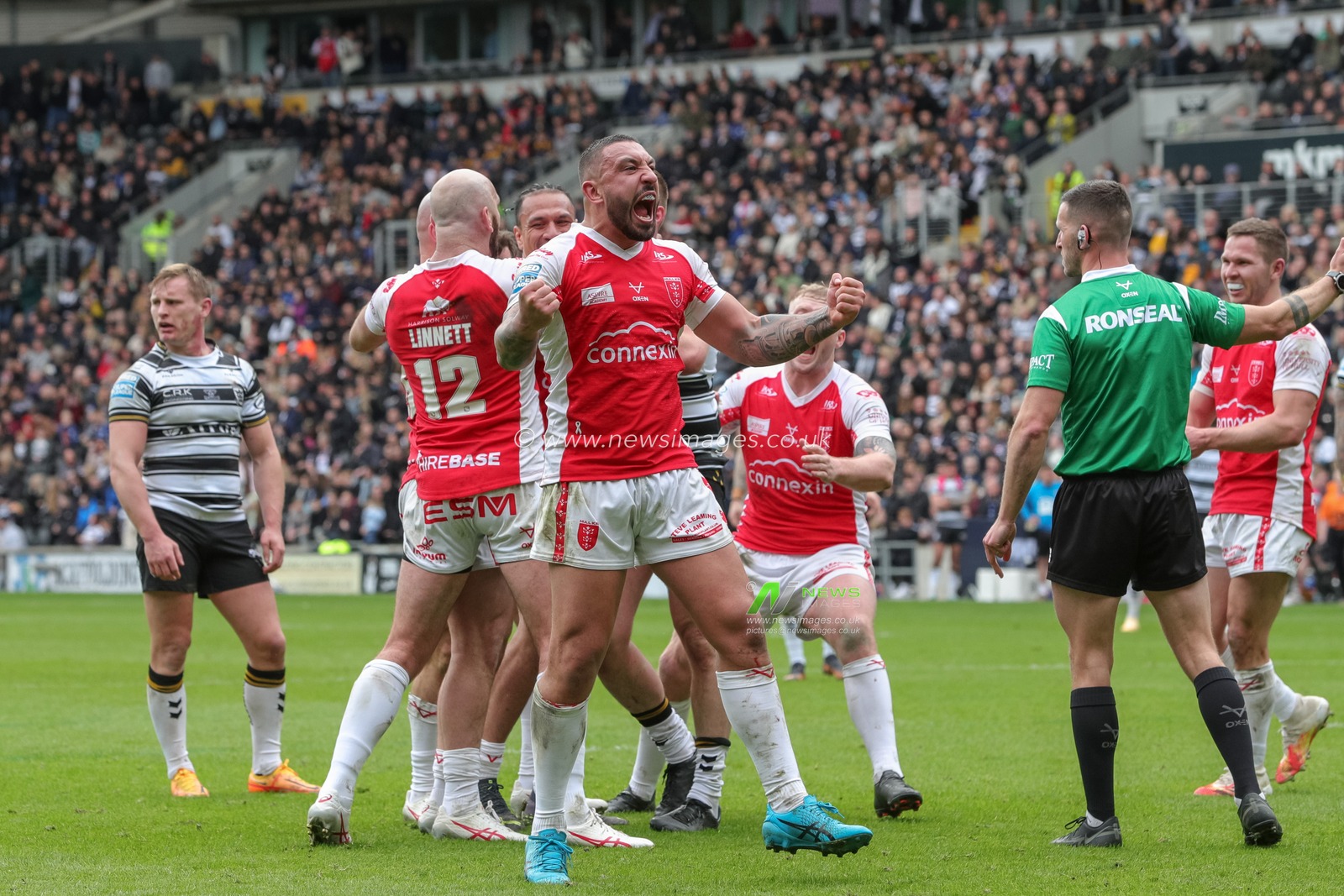Elliot Minchella #13 of Hull KR celebrates in front of the Hull KR fans during the Betfred Super League Round 8 match Hull FC vs Hull KR at MKM Stadium, Hull, United Kingdom, 7th April 2023

(Photo by James Heaton/News Images)