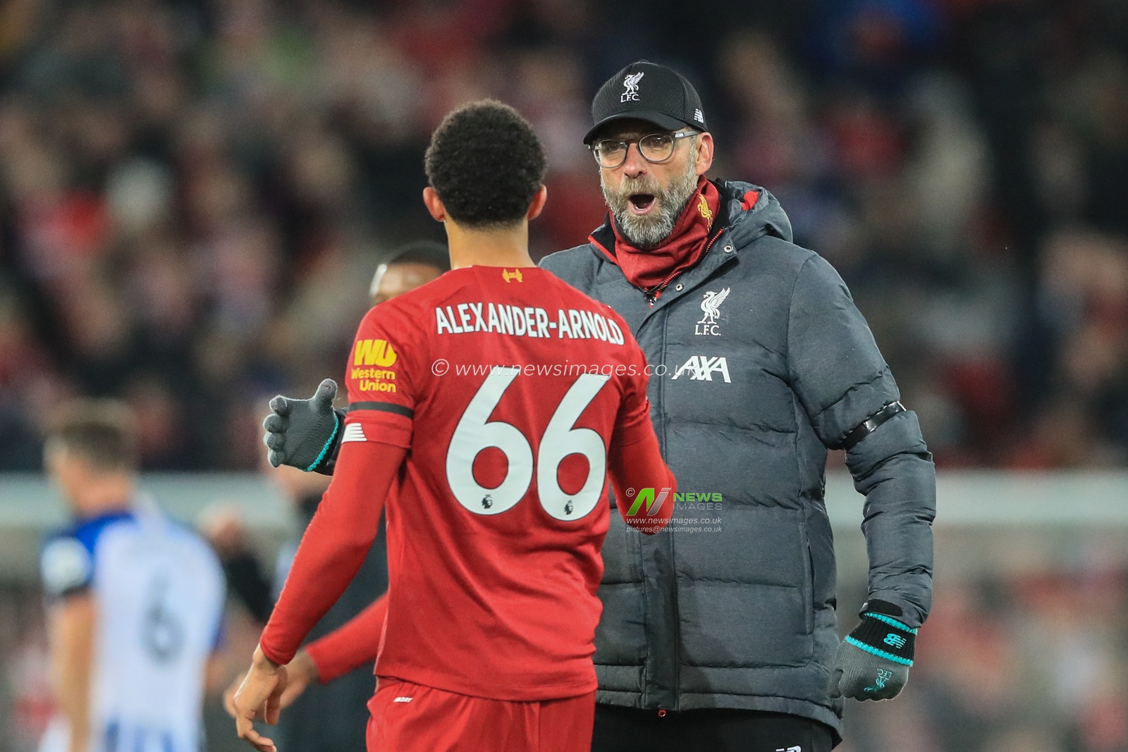 30th November 2019, Anfield, Liverpool, England; Premier League, Liverpool v Brighton and Hove Albion : Jurgen Klopp manager of Liverpool and Trent Alexander-Arnold (66) of Liverpool celebrate Liverpools 2-1 win 


Credit: Mark Cosgrove/News Images