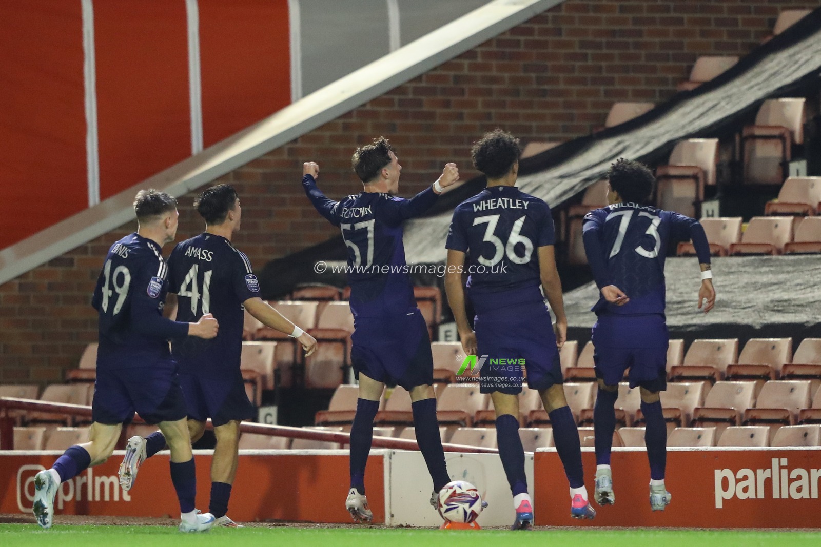 Jack Fletcher of Manchester United celebrates his goal to make it 2-2 during the Bristol Street Motors Trophy match Barnsley vs Manchester United U21 at Oakwell, Barnsley, United Kingdom, 20th August 2024

(Photo by Alfie Cosgrove/News Images)