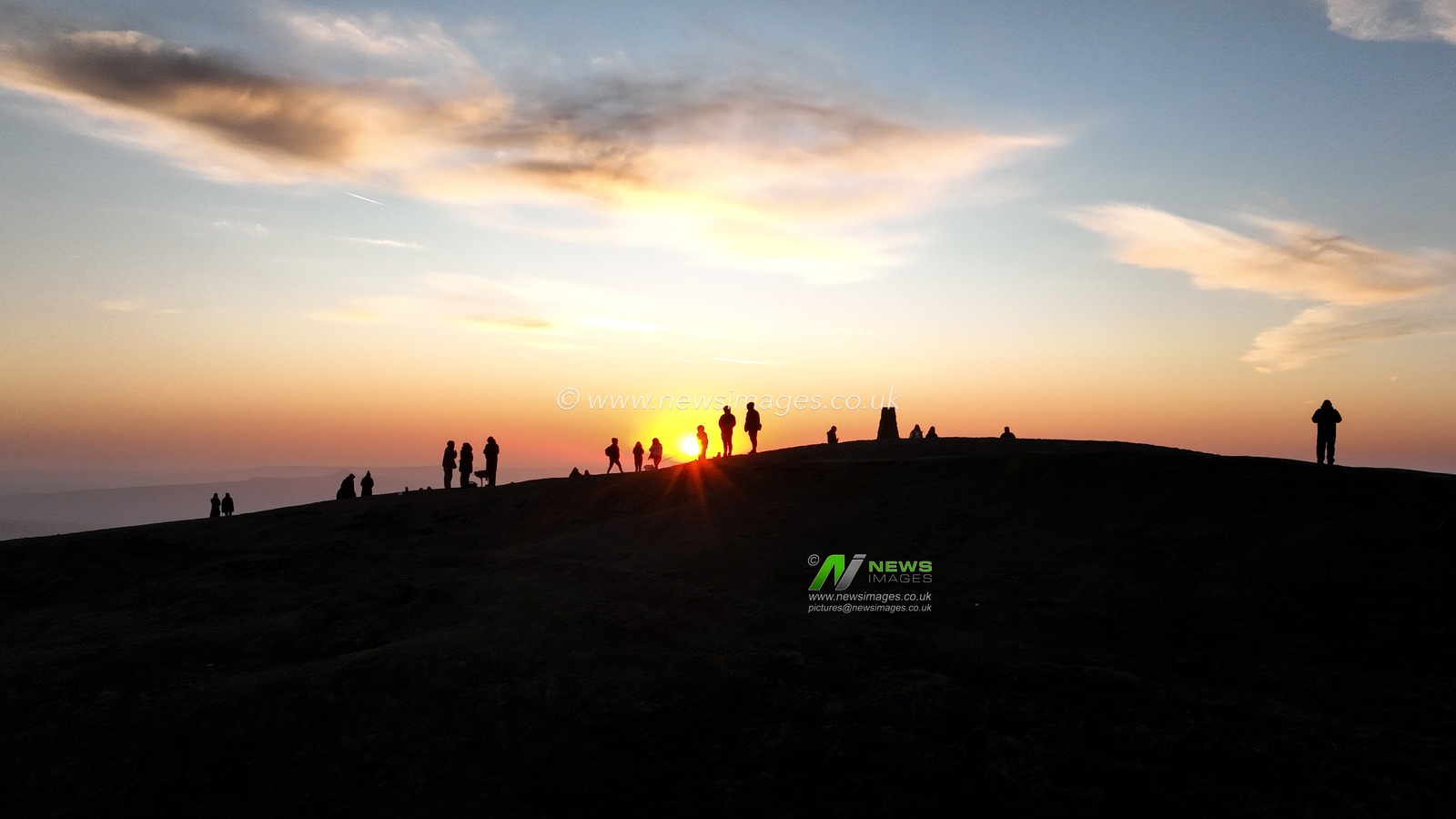 People head to the summit of Mam Tor to watch the sun rise as a blanket of fog lingers over the Hope Valley at Mam Tor, Peak District, United Kingdom, 19th March 2025

(Photo by Mark Cosgrove/News Images)