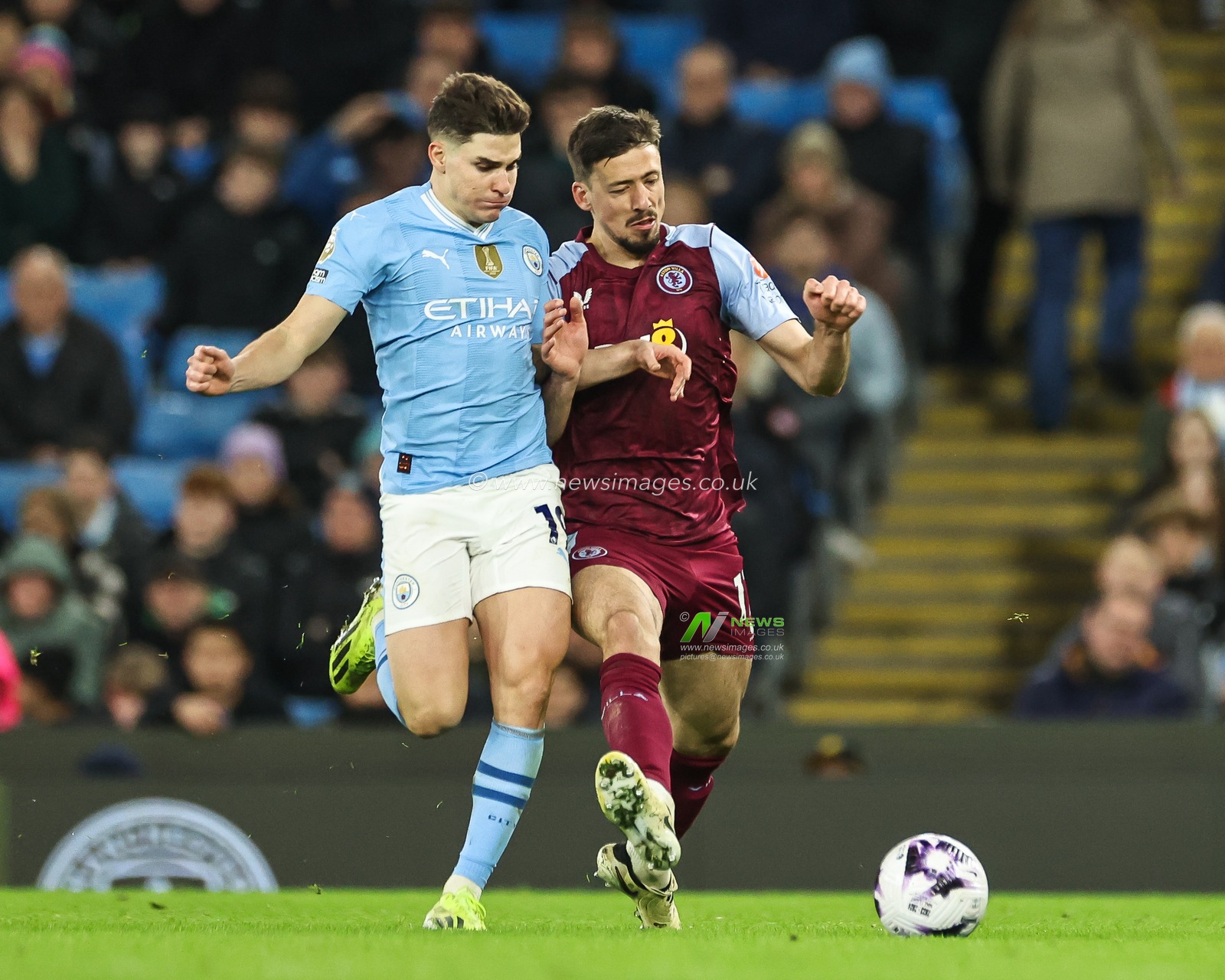JuliÃ¡n Ãlvarez of Manchester City and ClÃ©ment Lenglet of Aston Villa battle for the ball during the Premier League match Manchester City vs Aston Villa at Etihad Stadium, Manchester, United Kingdom, 3rd April 2024

(Photo by Mark Cosgrove/News Images)