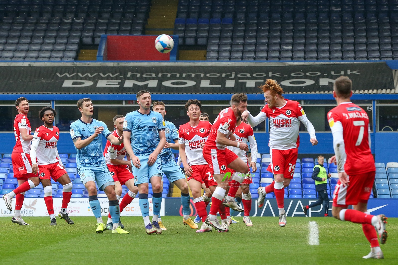 Ryan Woods #19 of Millwall heads the ball clear