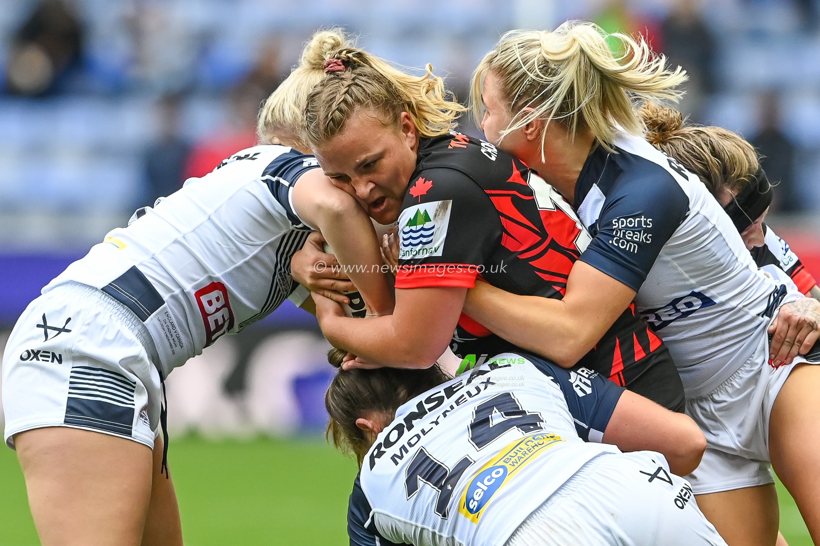 Rachel Chaboter of Canada is tackled by Tara Stanley, Vicky Molyneux and Georgia Roche England during the Women's Rugby League World Cup match England Women vs Canada Women at DW Stadium, Wigan, United Kingdom, 5th November 2022

(Photo by Craig Thomas/News Images)