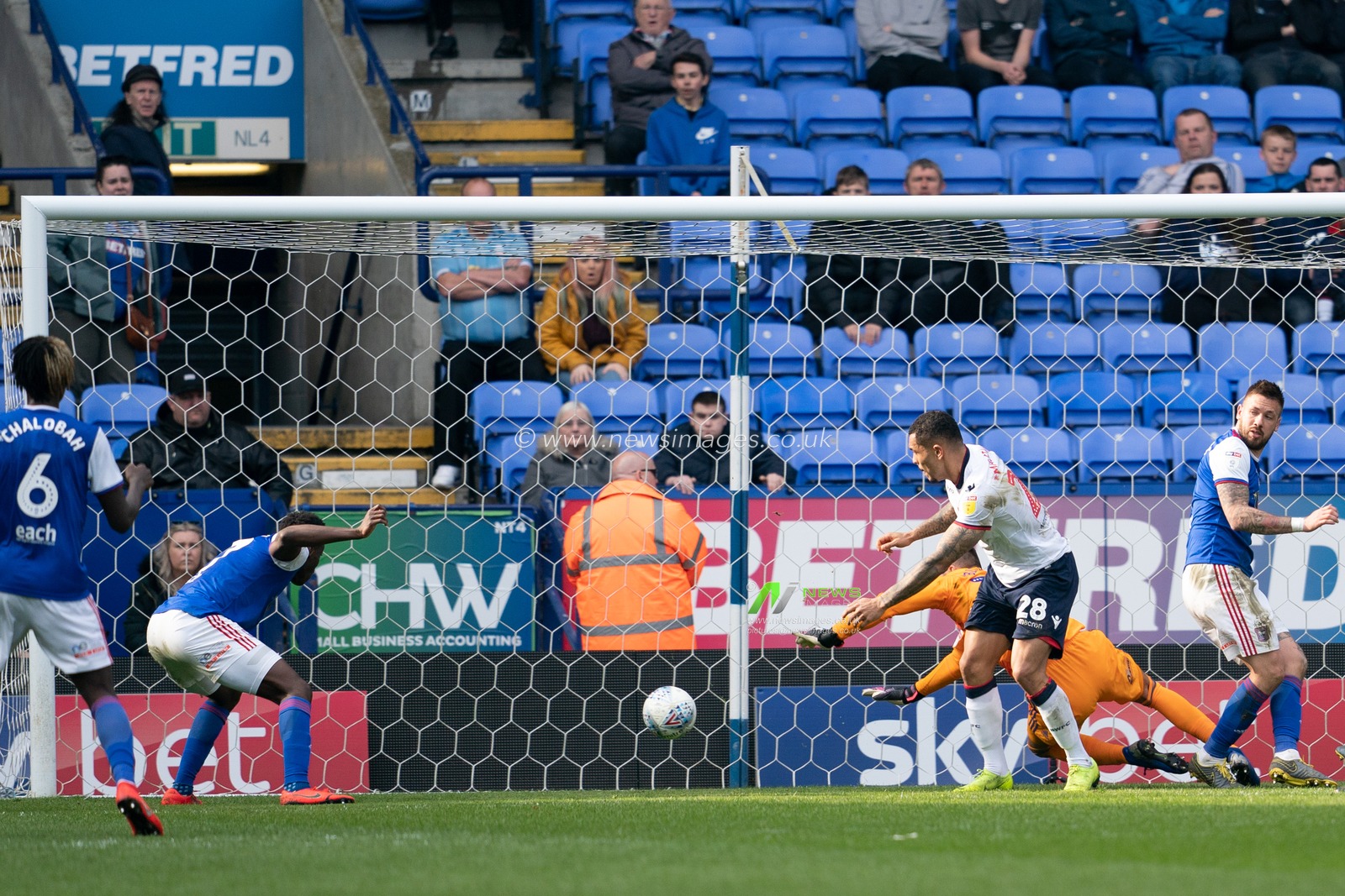 Ipswich Town Josh Emmanuel scores an own goal

6th April 2019 , University of Bolton Stadium, Bolton, England;  Sky bet Championship Football, Bolton Wanderers vs Ipswich Town 

Credit: Terry Donnelly/News Images