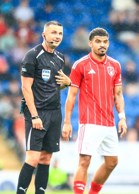 referee Michael Oliver and Morgan Gibbs-White of Nottingham Forest during the Pre-season friendly match Nottingham Forest vs Monaco at SMH Group Stadiumact Stadium, Chesterfield, United Kingdom, 19th July 2025

(Photo by Richard Bierton/News Images)