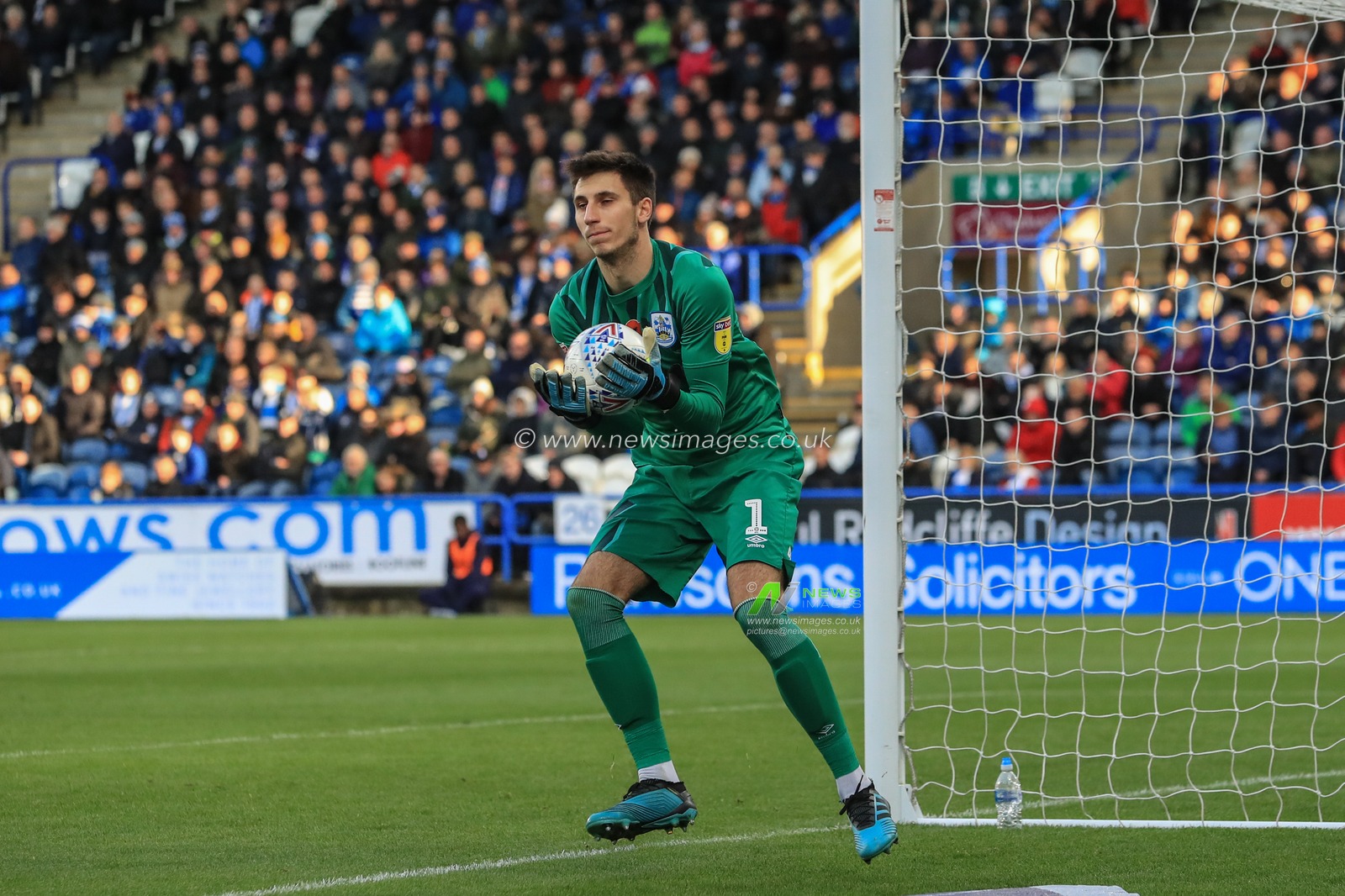 26th October 2019, John Smith's Stadium, Huddersfield, England; Sky Bet Championship, Huddersfield Town v Barnsley : Kamil Grabara (1) of Huddersfield Town catches the ball but its out of play 

Credit: Mark Cosgrove/News Images