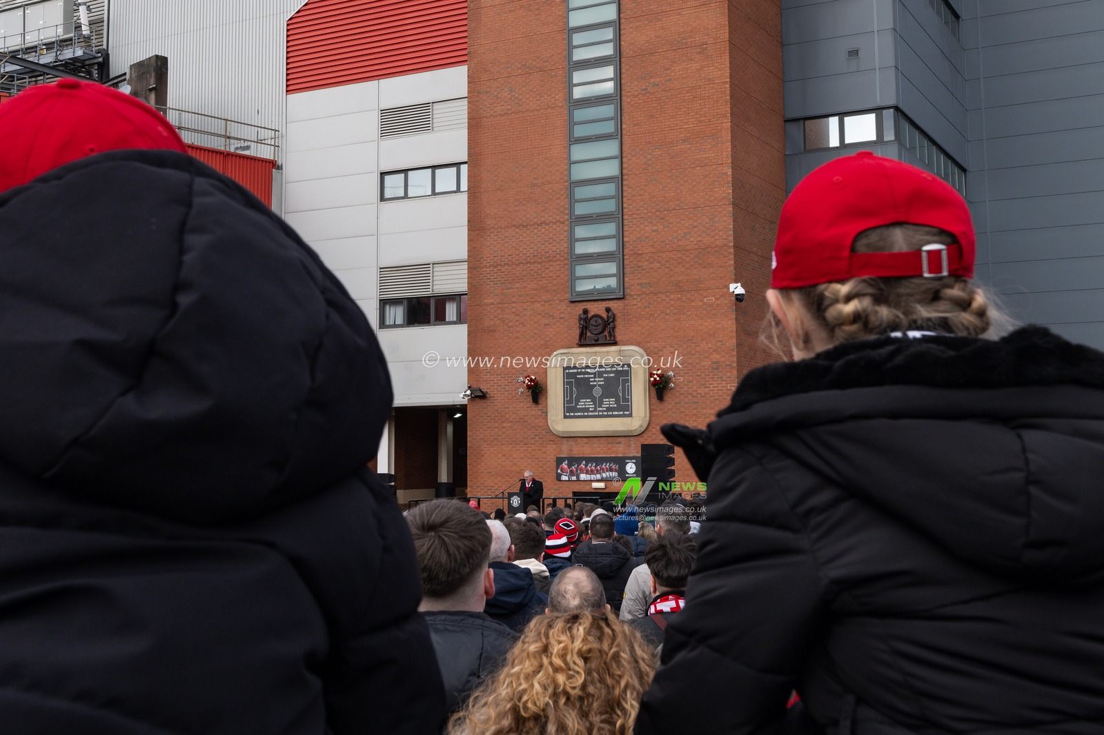 Manchester United fans in attendance at the remembrance service to the Munich air disaster which occurred on February 6th 1958 Home of Manchester United, ahead of the Premier League match Manchester United vs Crystal Palace at Old Trafford, Manchester, United Kingdom, 2nd February 2025

(Photo by Craig Thomas/News Images)