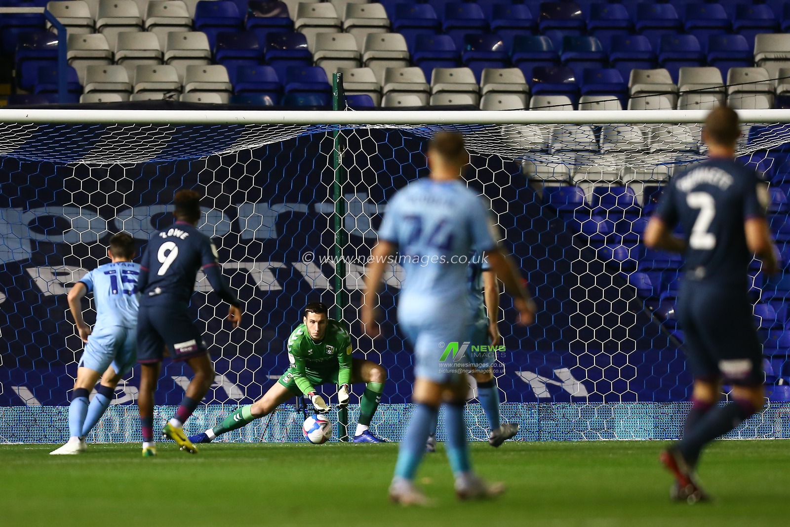 Marko Marosi (1) of Coventry City saves a shot for Jamal Lowe (9) of Swansea City