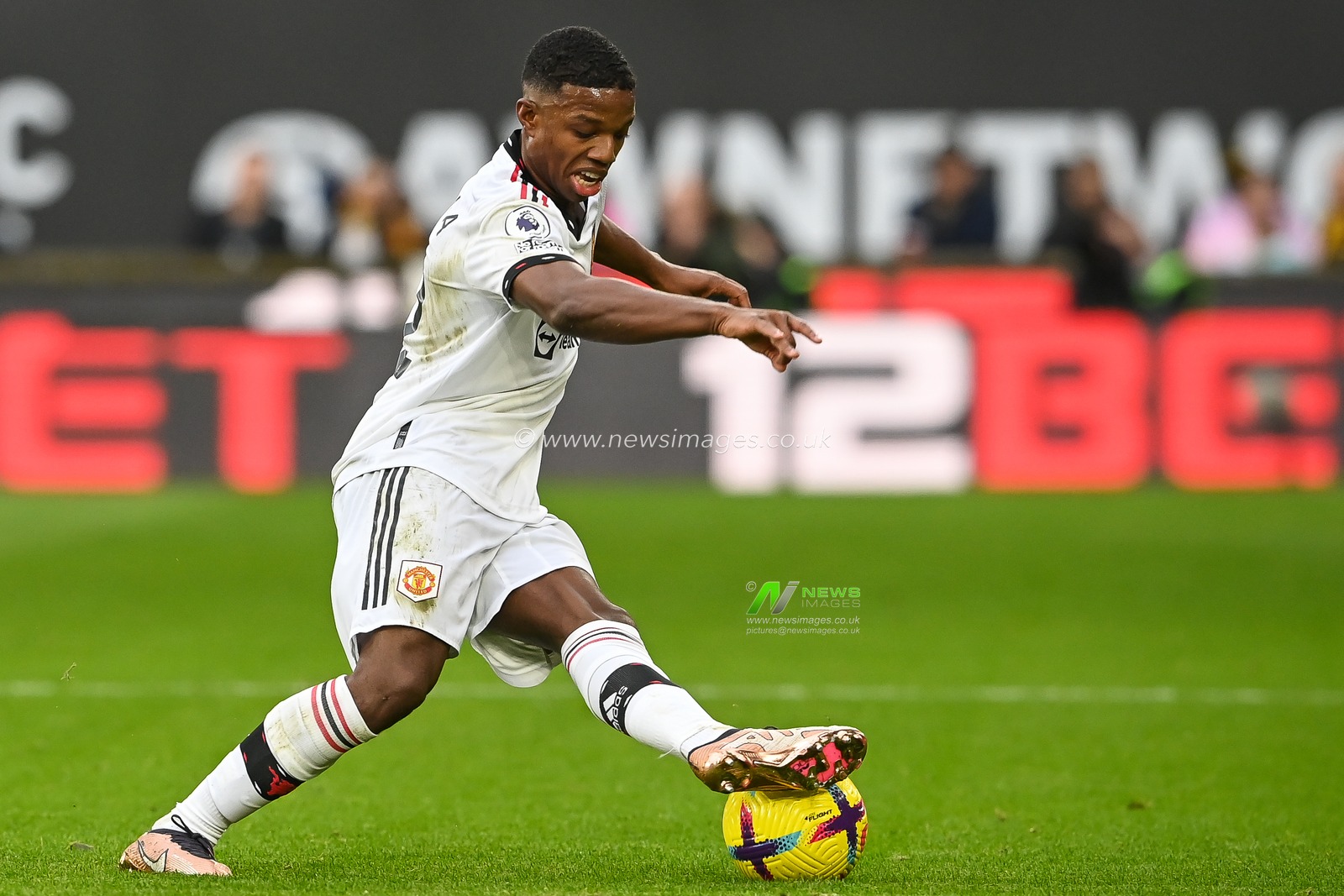 Tyrell Malacia #12 of Manchester United in action during the Premier League match Wolverhampton Wanderers vs Manchester United at Molineux, Wolverhampton, United Kingdom, 31st December 2022

(Photo by Craig Thomas/News Images)