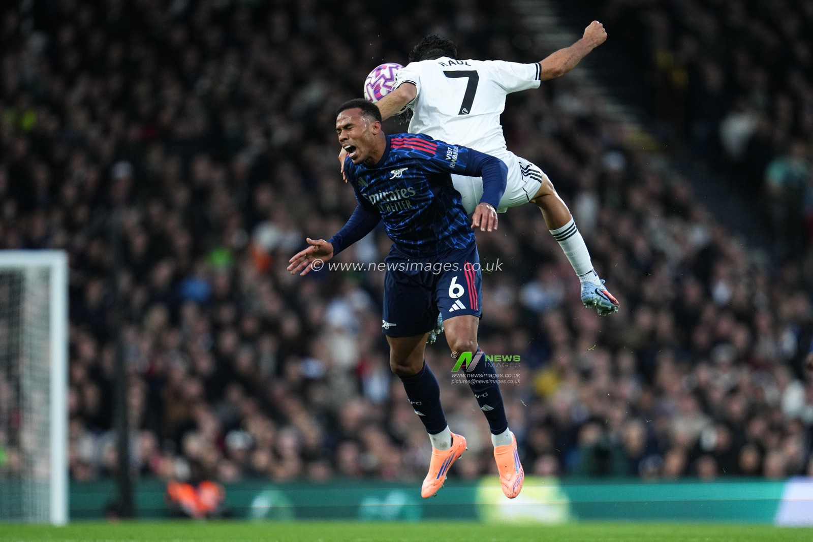 Gabriel of Arsenal and Raul Jimenez of Fulham during the Premier League match Fulham vs Arsenal at Craven Cottage, London, United Kingdom, 18th October 2025

(Photo by Harvey Murphy/News Images)