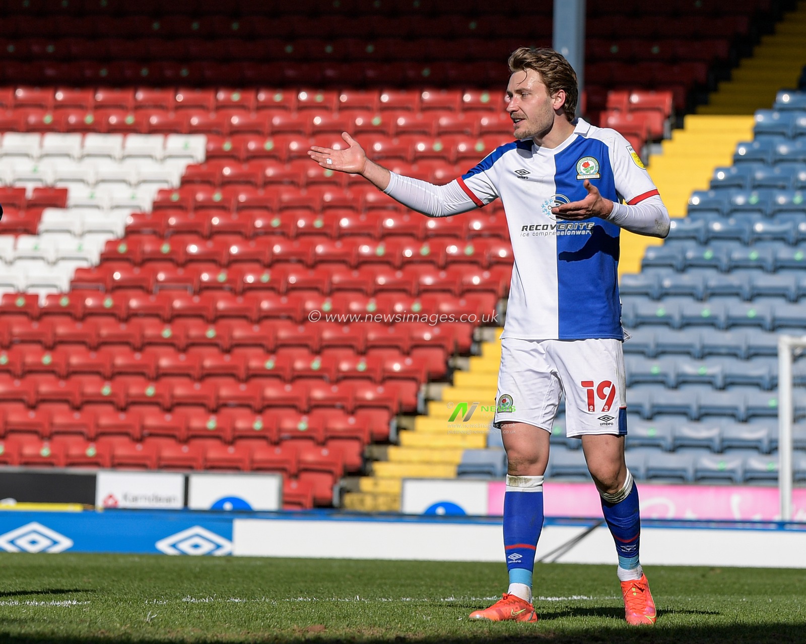 Tom Trybull #19 of Blackburn Rovers gives instructions during the game