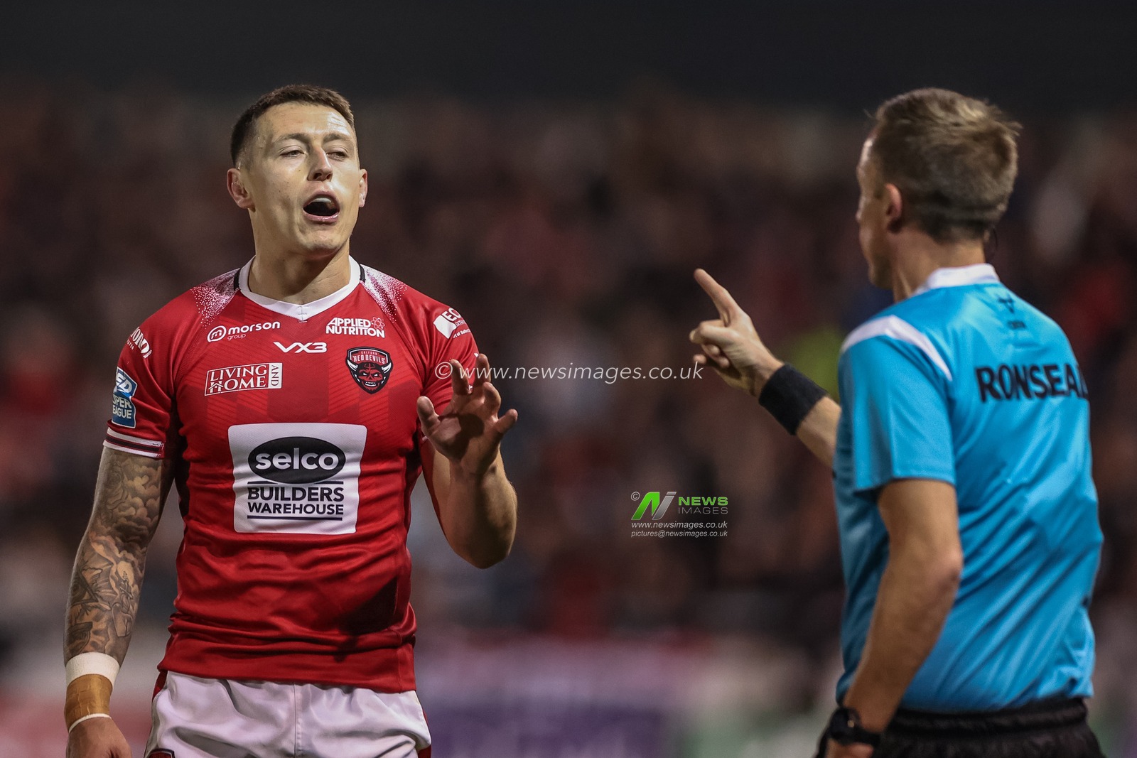 Deon Cross of Salford Red Devils reacts with the line official during the Betfred Super League play-off Eliminator 1 Salford Red Devils v Leigh Leopards at Salford Community Stadium, Eccles, United Kingdom, 27th September 2024

(Photo by Mark Cosgrove/News Images)