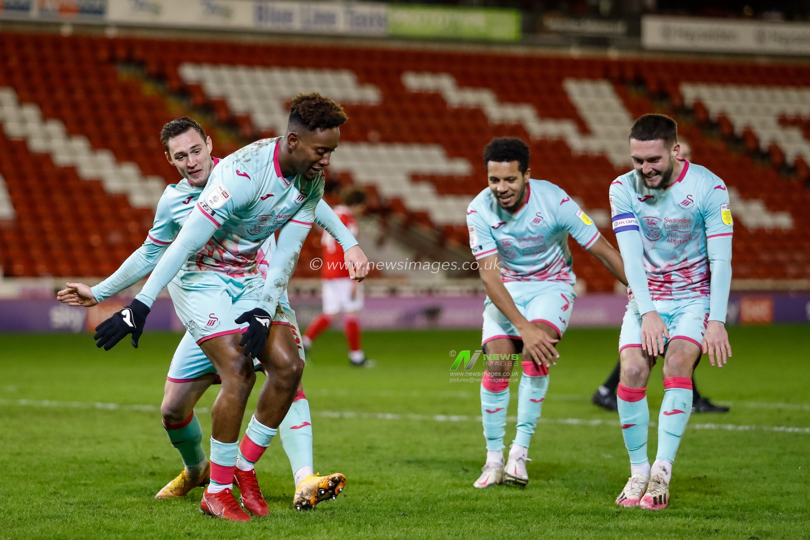 Jamal Lowe #9 of Swansea City celebrates his goal to make it 0-2