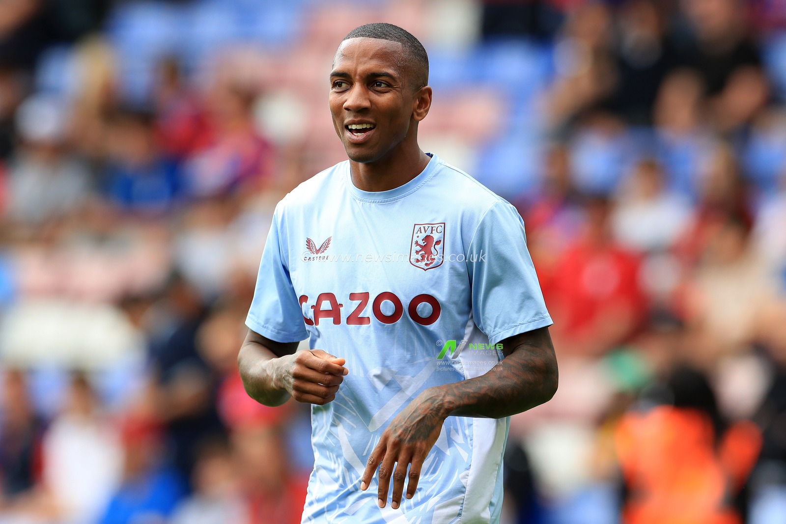 Ashley Young of Aston Villa warming up prior to kick off.