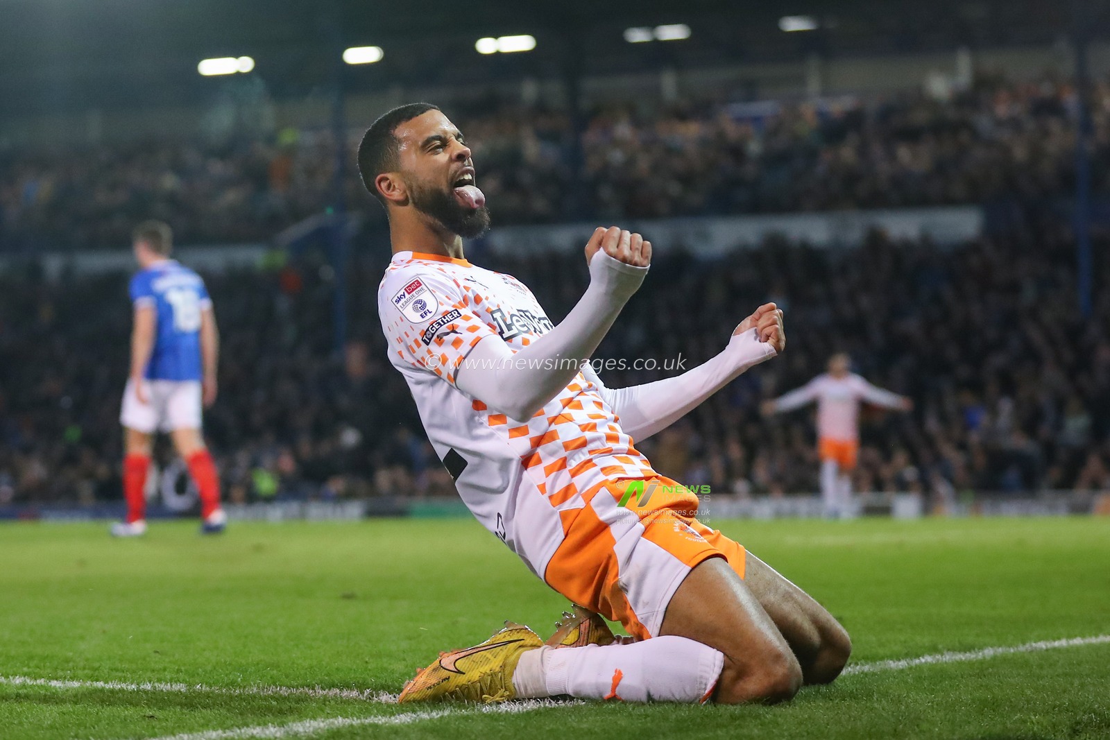 CJ Hamilton #22 of Blackpool celebrates his goal to make it 0-3 during the Sky Bet League 1 match Portsmouth vs Blackpool at Fratton Park, Portsmouth, United Kingdom, 25th November 2023

(Photo by Gareth Evans/News Images)