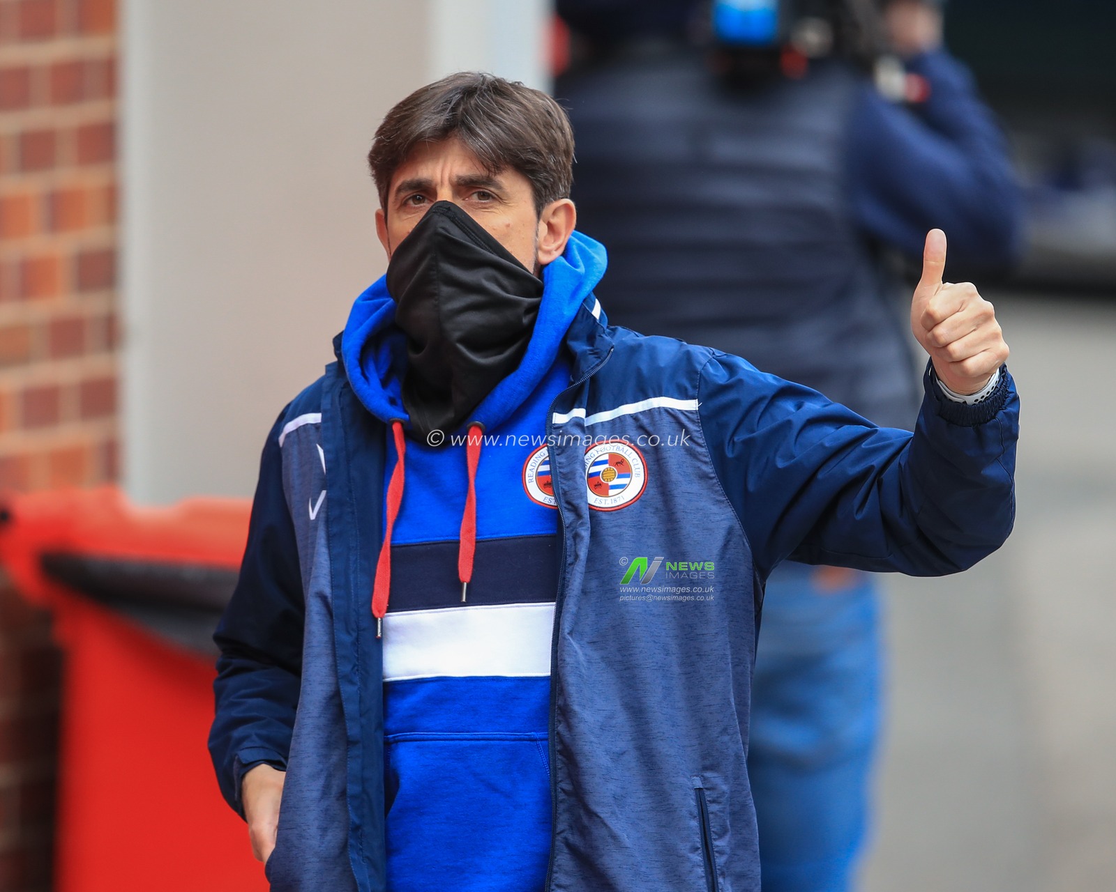 Veljko PaunoviÄ‡ manager of Reading give the thumbs up as he arrives at Oakwell