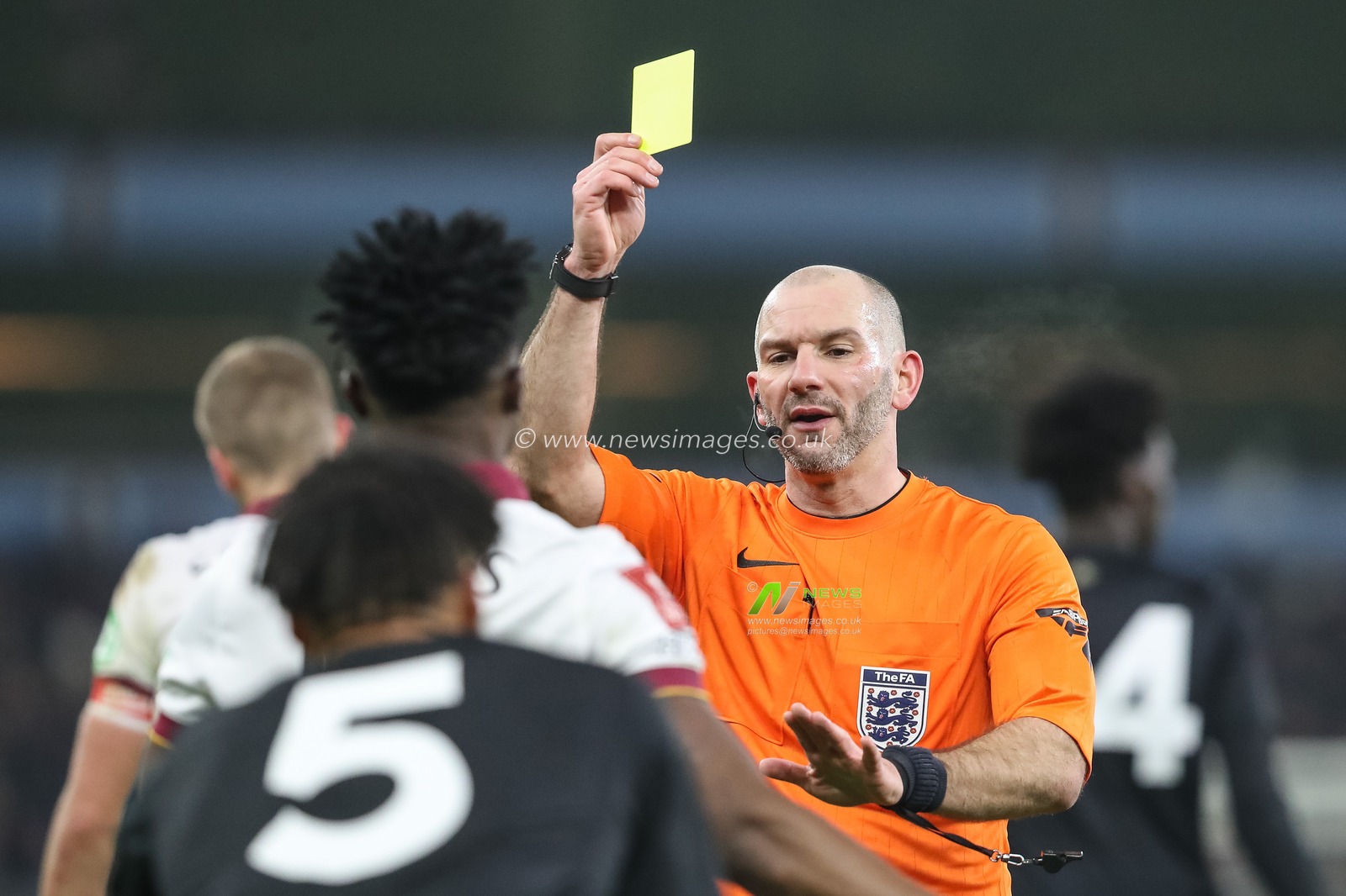 Referee Tim Robinson gives a yellow card to Mohammed Kudus of West Ham United during the Emirates FA Cup 3rd Round match Aston Villa vs West Ham United at Villa Park, Birmingham, United Kingdom, 10th January 2025

(Photo by Gareth Evans/News Images)