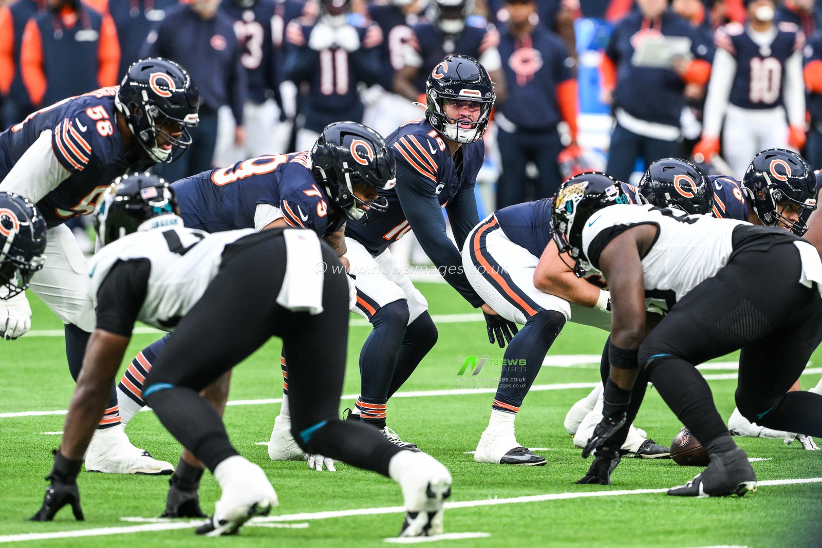 Caleb Williams of the Chicago Bears prepares to take the snap during the Week 6 match Chicago Bears vs Jacksonville Jaguars at Tottenham Hotspur Stadium, London, United Kingdom, 13th October 2024

(Photo by Craig Thomas/News Images)