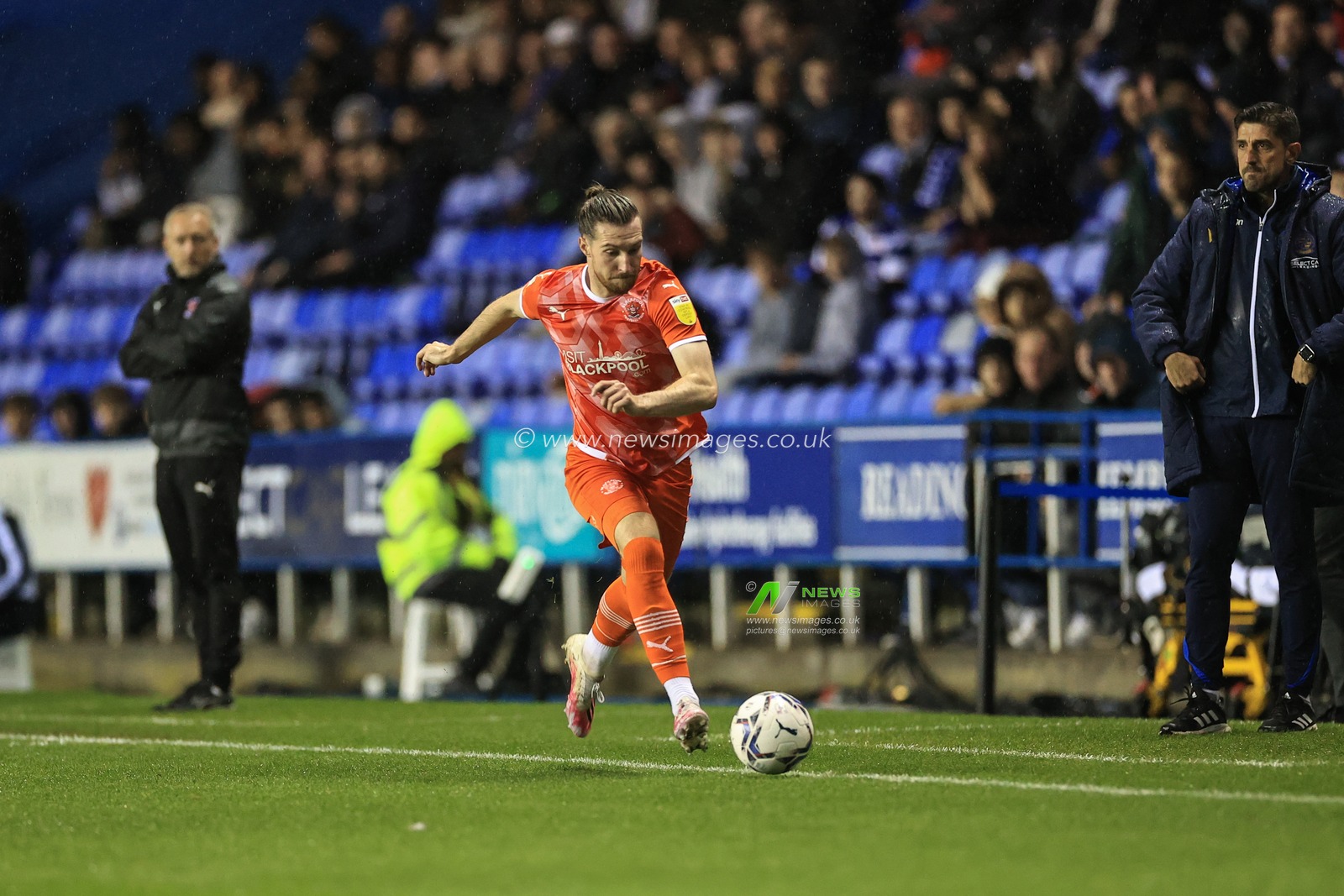 James Husband #3 of Blackpool breaks with the ball