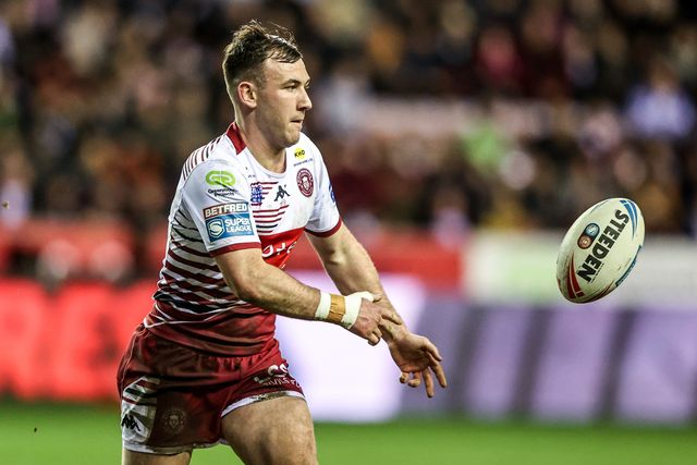 Harry Smith of Wigan Warriors passes the ball during the Betfred Super League match Wigan Warriors vs Leigh Leopards at The Brick Community Stadium, Wigan, United Kingdom on 26 February 2026

(Photo by Alfie Cosgrove/News Images)
