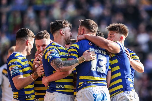 Ben Currie of Warrington Wolves celebrates his try during the Betfred Super League round 5 match Warrington Wolves vs Castleford Tigers at The Halliwell Jones Stadium, Warrington, United Kingdom on 21 March 2026

(Photo by Alfie Cosgrove/News Images)