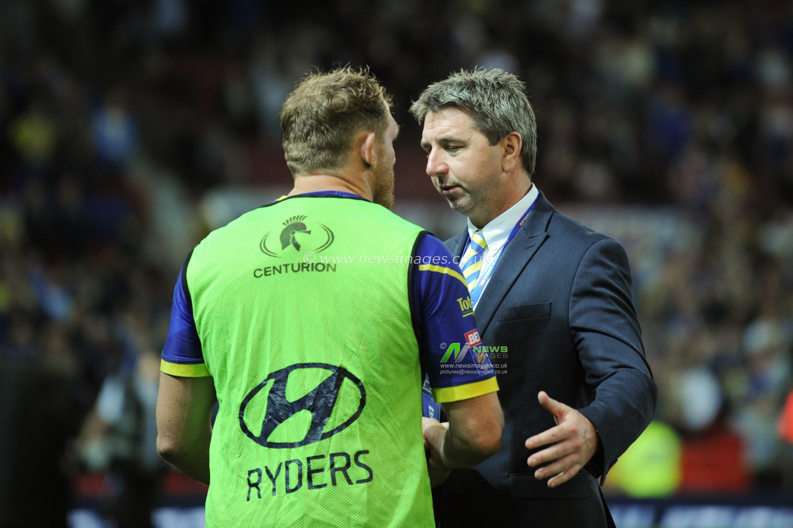 13th October 2018 , Old Trafford,  Manchester, England;  Betfred Super League Grand Final, Wigan Warriors v Warrington Wolves; Steve Price Head Coach of Warrington Wolves commiserates Ben Westwood of Warrington Wolves following the defeat 


Credit: Richard Long/News Images