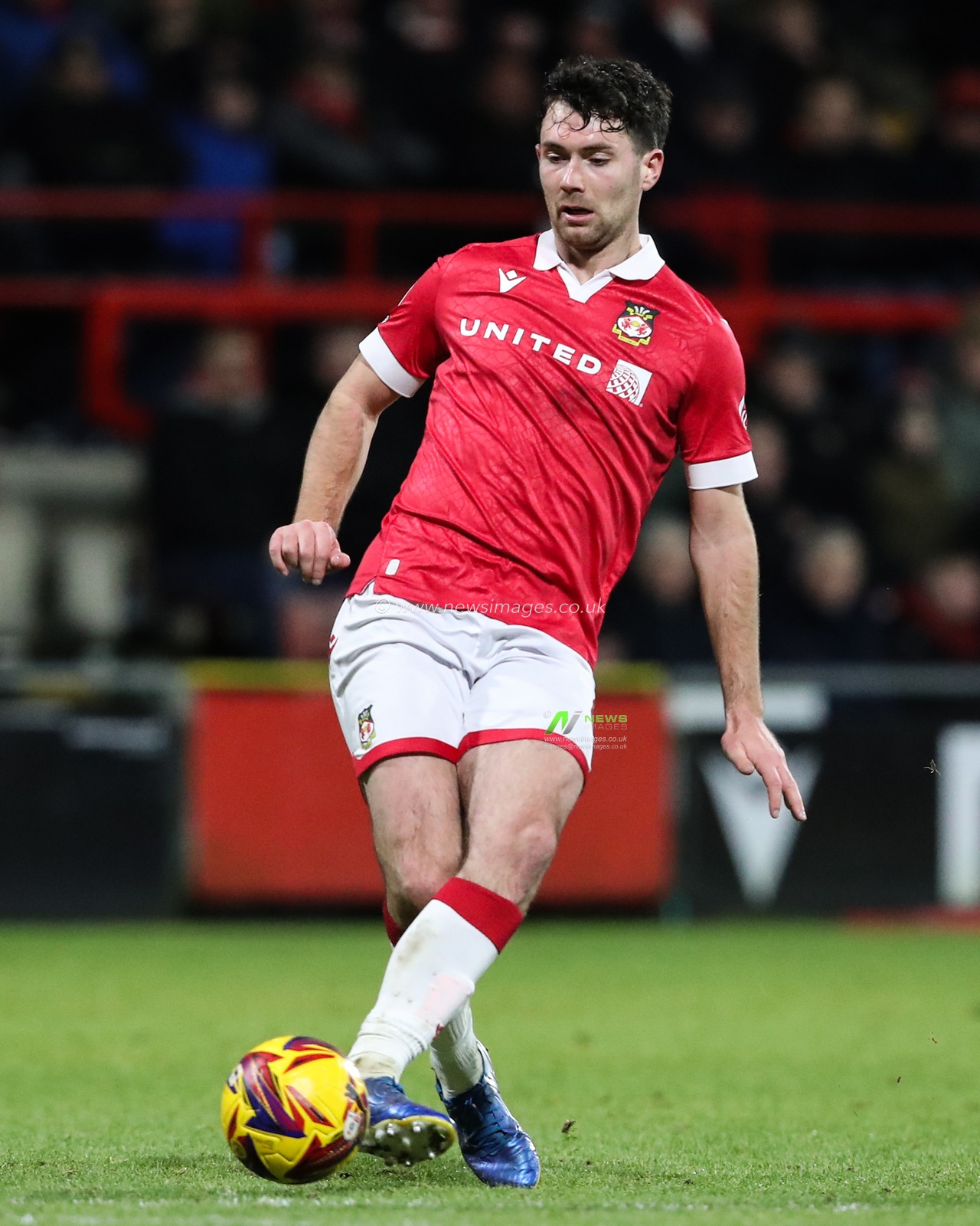 Thomas O'Connor of Wrexham passes the ball during the Sky Bet League 1 match Wrexham vs Birmingham City at SToK Cae Ras, Wrexham, United Kingdom, 23rd January 2025

(Photo by Gareth Evans/News Images)