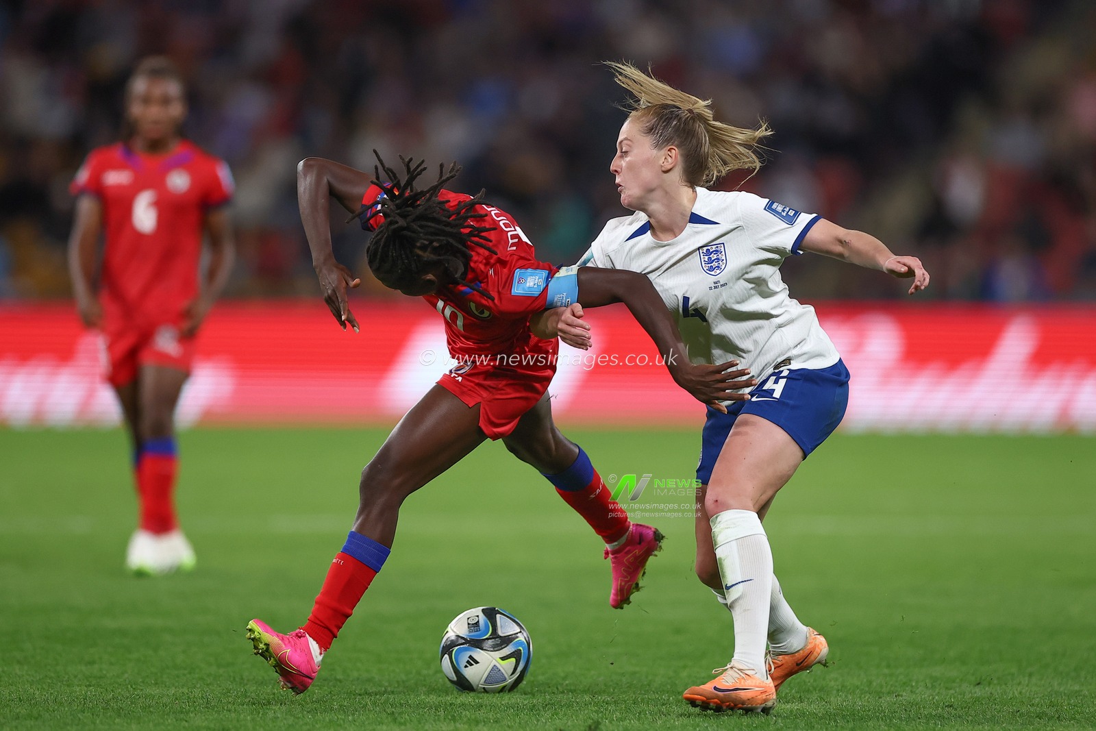 NÃ©rilia MondÃ©sir #10 of Haiti tackles the ball off Keira Walsh #4 of England during the FIFA Women's World Cup 2023 Group D England Women vs Haiti Women at Suncorp Stadium, Brisbane, Australia, 22nd July 2023

(Photo by Patrick Hoelscher/News Images)