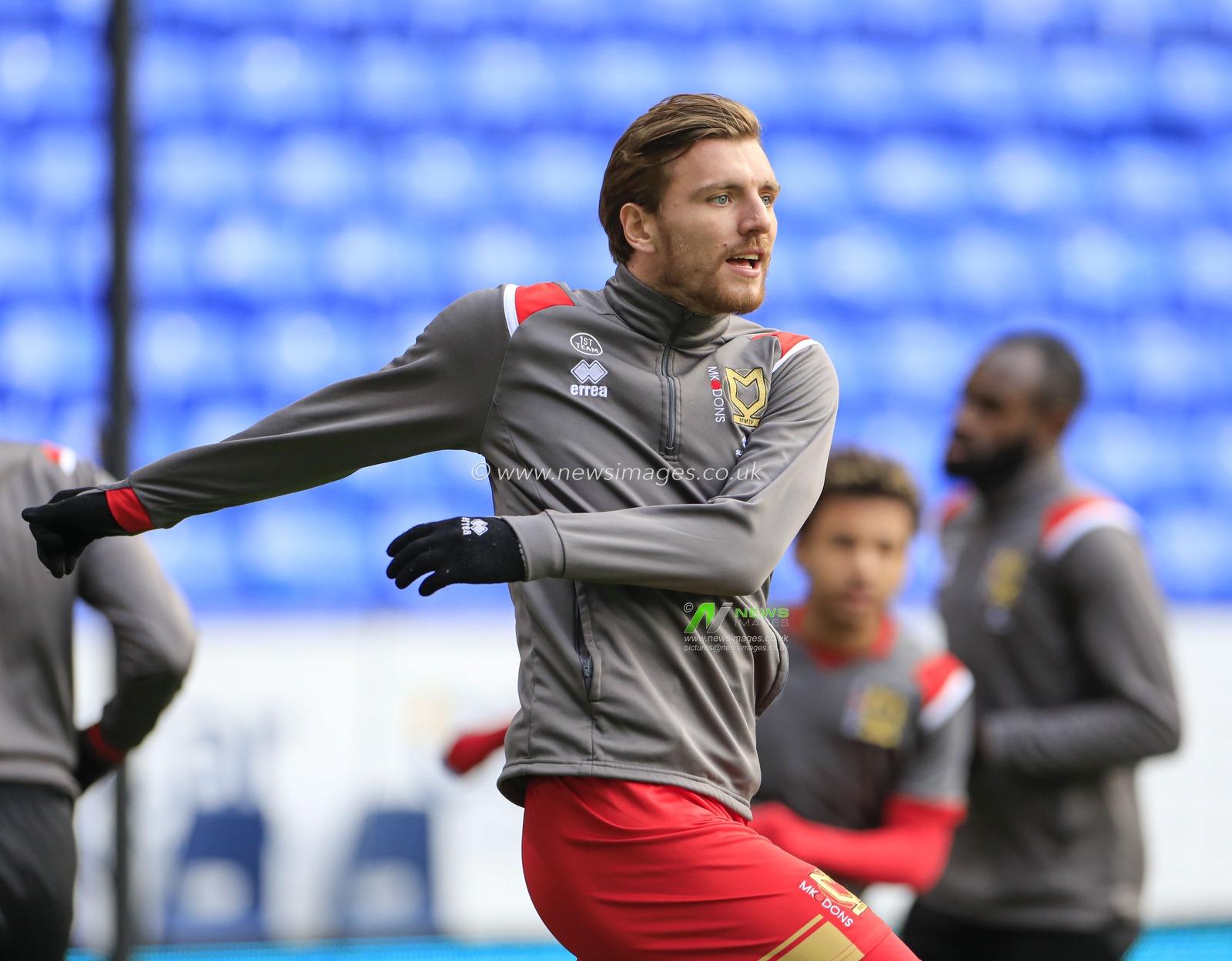 16th November 2019, University of Bolton Stadium, Bolton, England; Sky Bet League 1, Bolton Wanderers v MK Dons : Alex Gibley (8) of Milton Keynes Dons warms up for the game

Credit: Conor Molloy/News Images