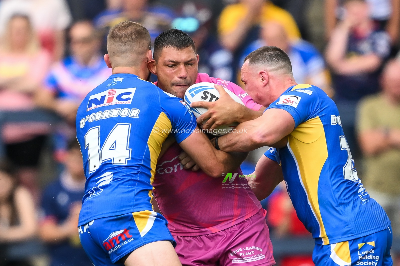 Ryan Hall of Hull KR is tackled by James Donaldson of Leeds Rhinos and Jarrod Oâ€™Connor of Leeds Rhinos during the Betfred Super League Round 18 match Leeds Rhinos vs Hull KR at Headingley Stadium, Leeds, United Kingdom, 20th July 2024

(Photo by Craig Thomas/News Images)