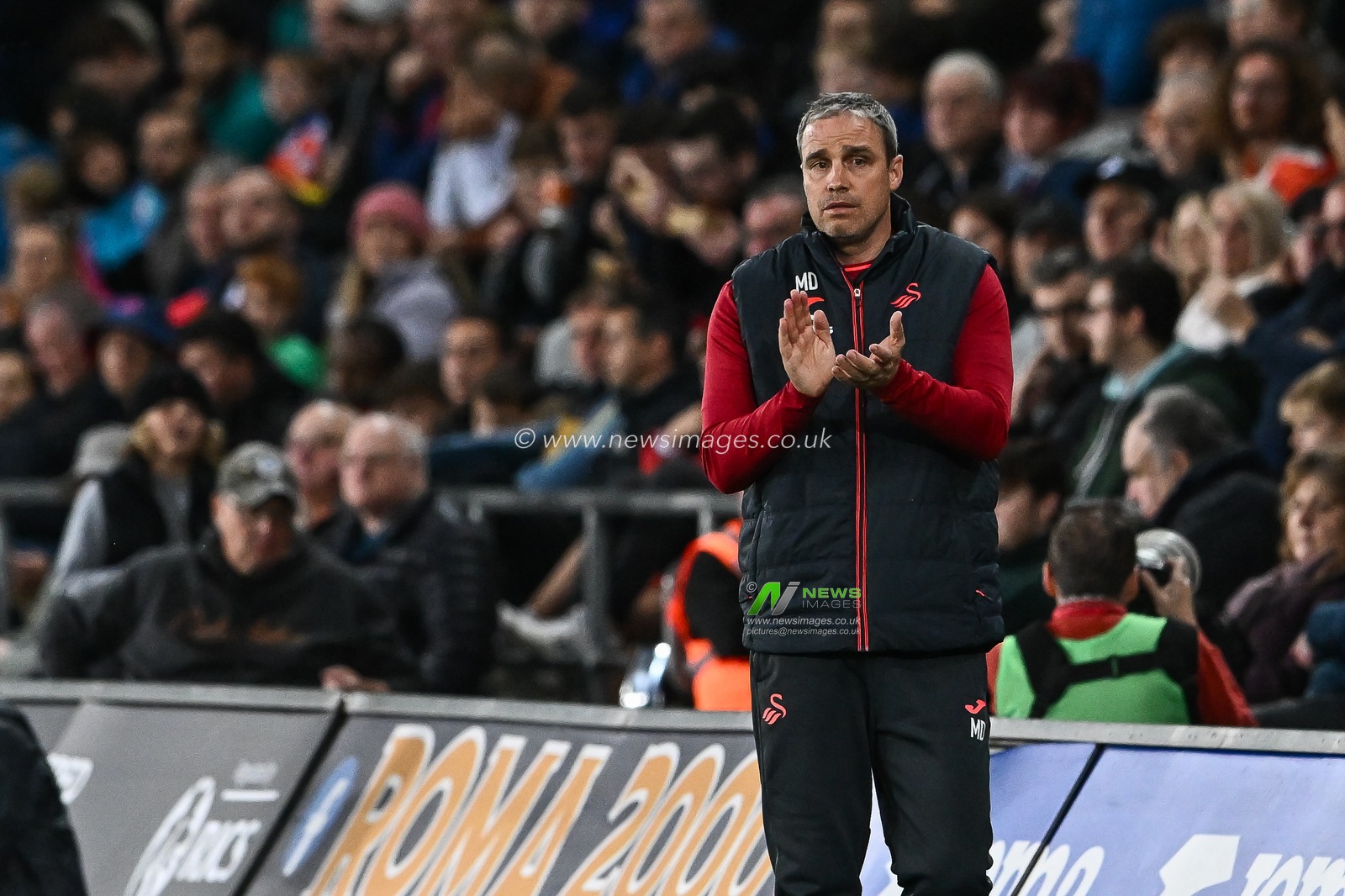 Michael Duff Manager of Swansea City applauds his team during the Sky Bet Championship match Swansea City vs Norwich City at Swansea.com Stadium, Swansea, United Kingdom, 4th October 2023

(Photo by Craig Thomas/News Images)