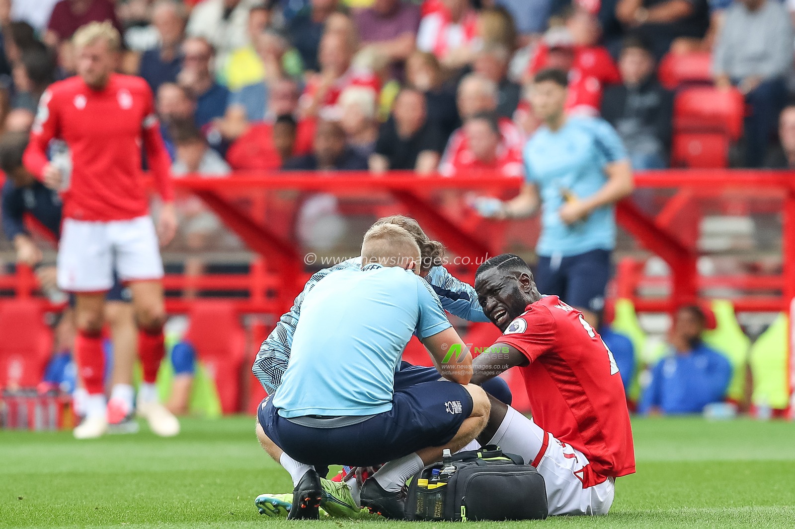 Cheikhou Kouyate #21 of Nottingham Forest receives medical treatment during the Premier League match Nottingham Forest vs Bournemouth at City Ground, Nottingham, United Kingdom, 3rd September 2022

(Photo by Gareth Evans/News Images)