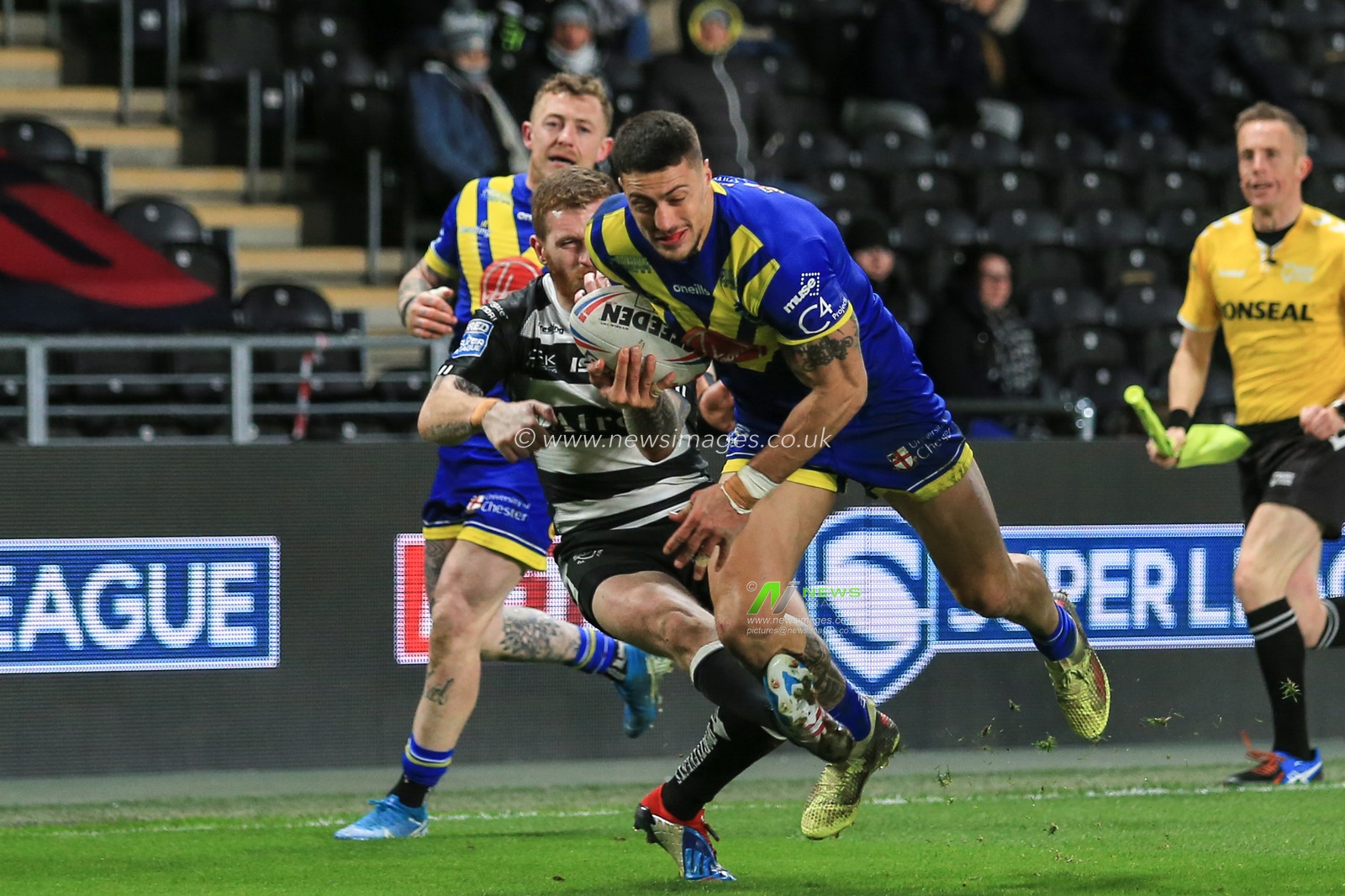 12th March 2020, KCOM Stadium, Hull, England; Betfred Super League, Hull FC v Warrington Wolves : Anthony Gelling (3) of Warrington Wolves is stopped short of the line by Marc Sneyd (7) of Hull FC