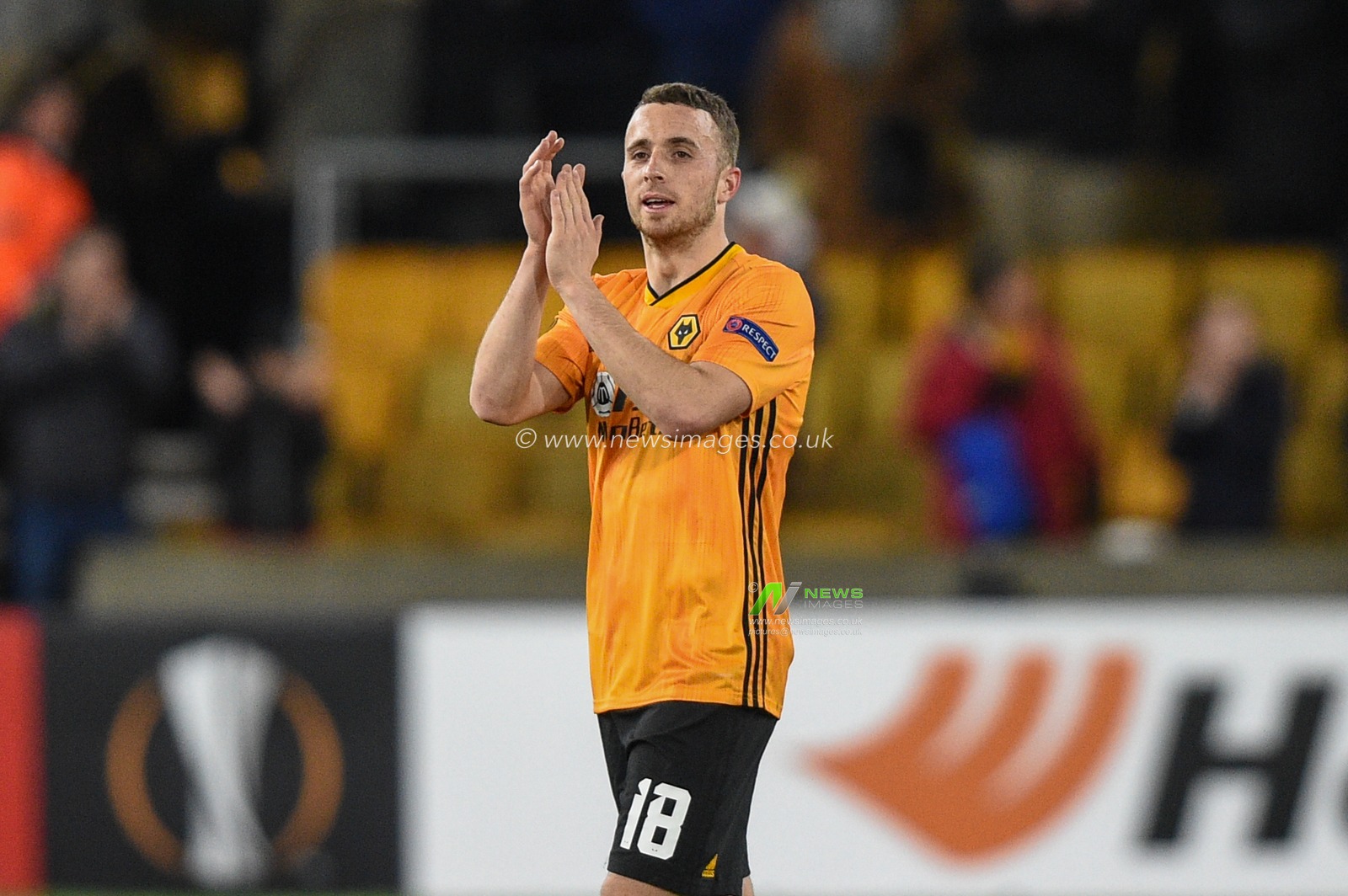 12th December 2019, Molineux, Wolverhampton, England; UEFA Europa League, Wolverhampton Wanderers v Besiktas : Hat-trick hero Diogo Jota (18) of Wolverhampton Wanderers applauds the fans as Wolves win 4-0 

Credit: Richard Long/News Images