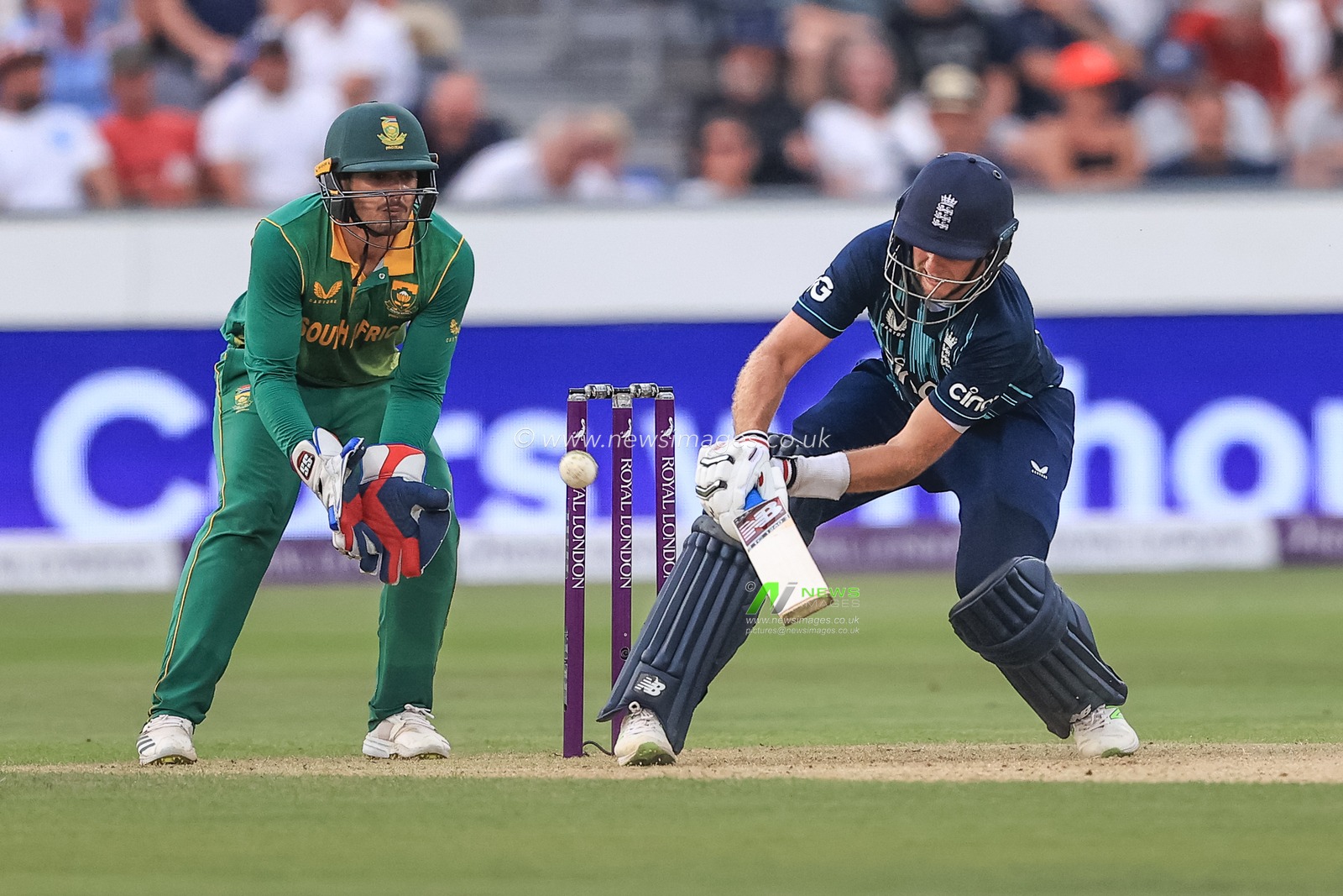 Joe Root of England with a reverse sweep for a boundary