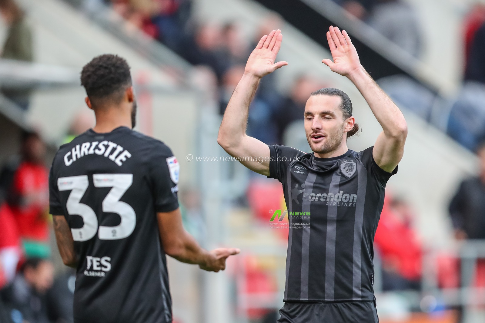 Cyrus Christie #33 of Hull City and Lewis Coyle #2 of Hull City embrace after the Sky Bet Championship match Rotherham United vs Hull City at New York Stadium, Rotherham, United Kingdom, 22nd October 2022

(Photo by Gareth Evans/News Images)