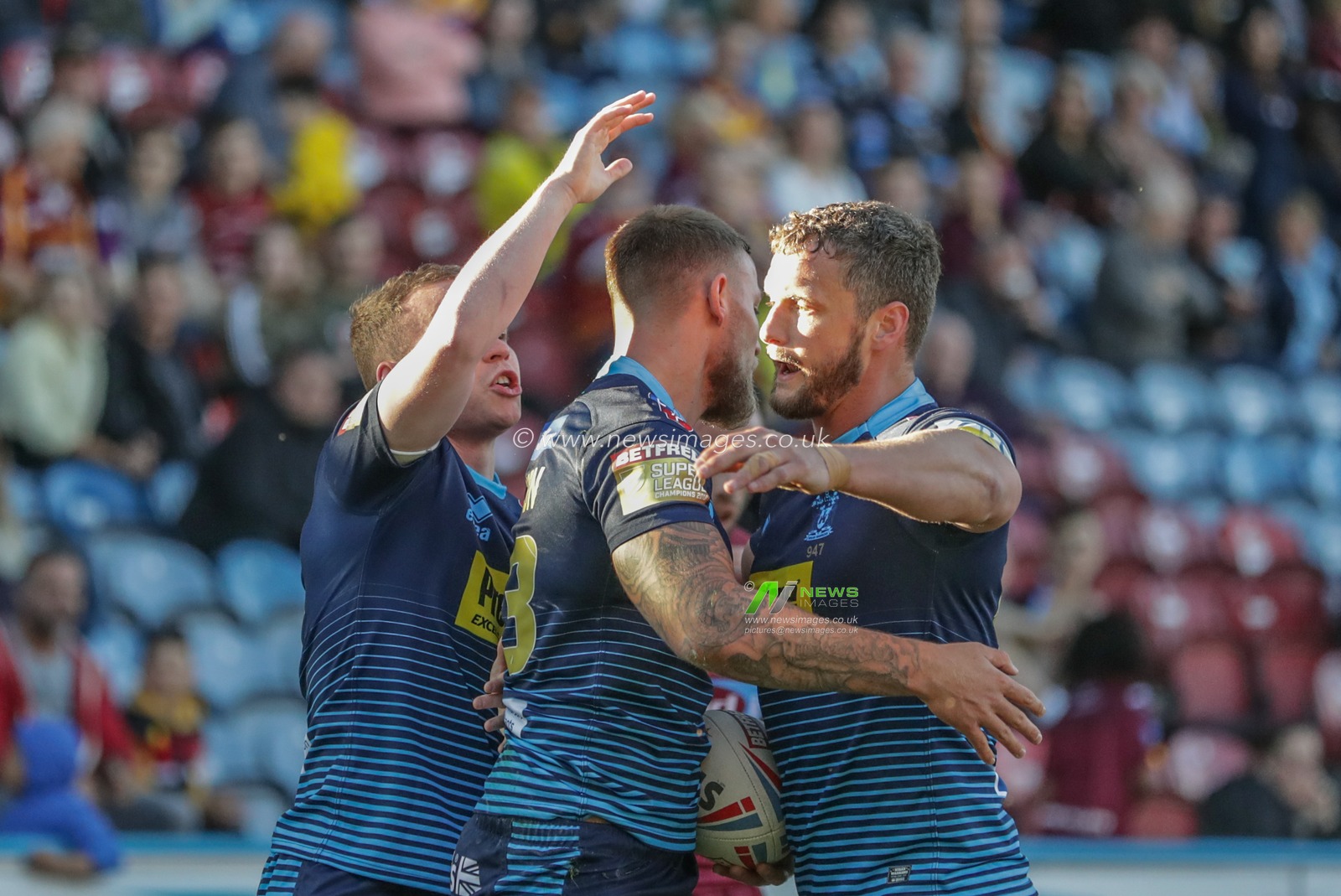 21st June 2019 , John Smiths Stadium, Huddersfield, England; Betfred Super League, Round 19, Huddersfield Giants vs Wigan Warriors ; Chris Hankinson (23) of Wigan Warriors celebrates his try 


Credit Mark Cosgrove/News Images