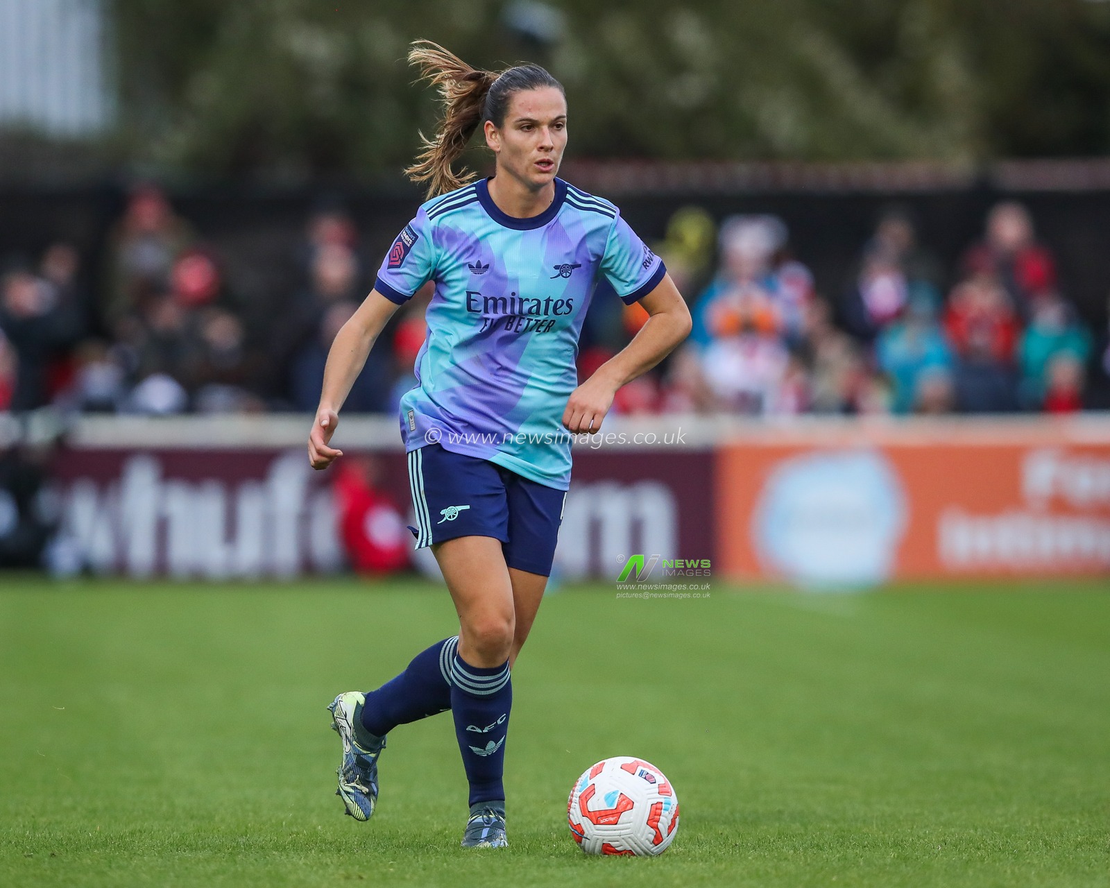Laia Codina of Arsenal runs with the ball during the Barclays Women's Super League match West Ham United Women vs Arsenal Women at Chigwell Construction Stadium, Dagenham, United Kingdom, 20th October 2024

(Photo by Izzy Poles/News Images)