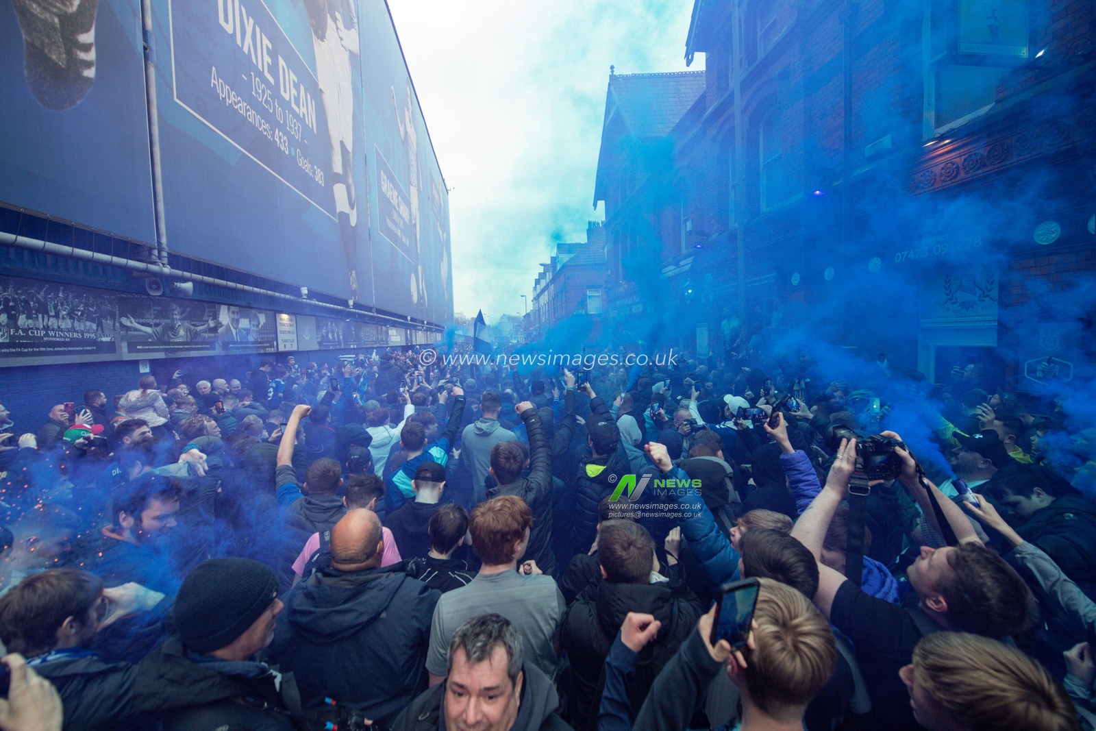 Everton fans wait for the team bus to arrive ahead of the Premier League match Everton vs Newcastle United at Goodison Park, Liverpool, United Kingdom, 27th April 2023

(Photo by Craig Thomas/News Images)