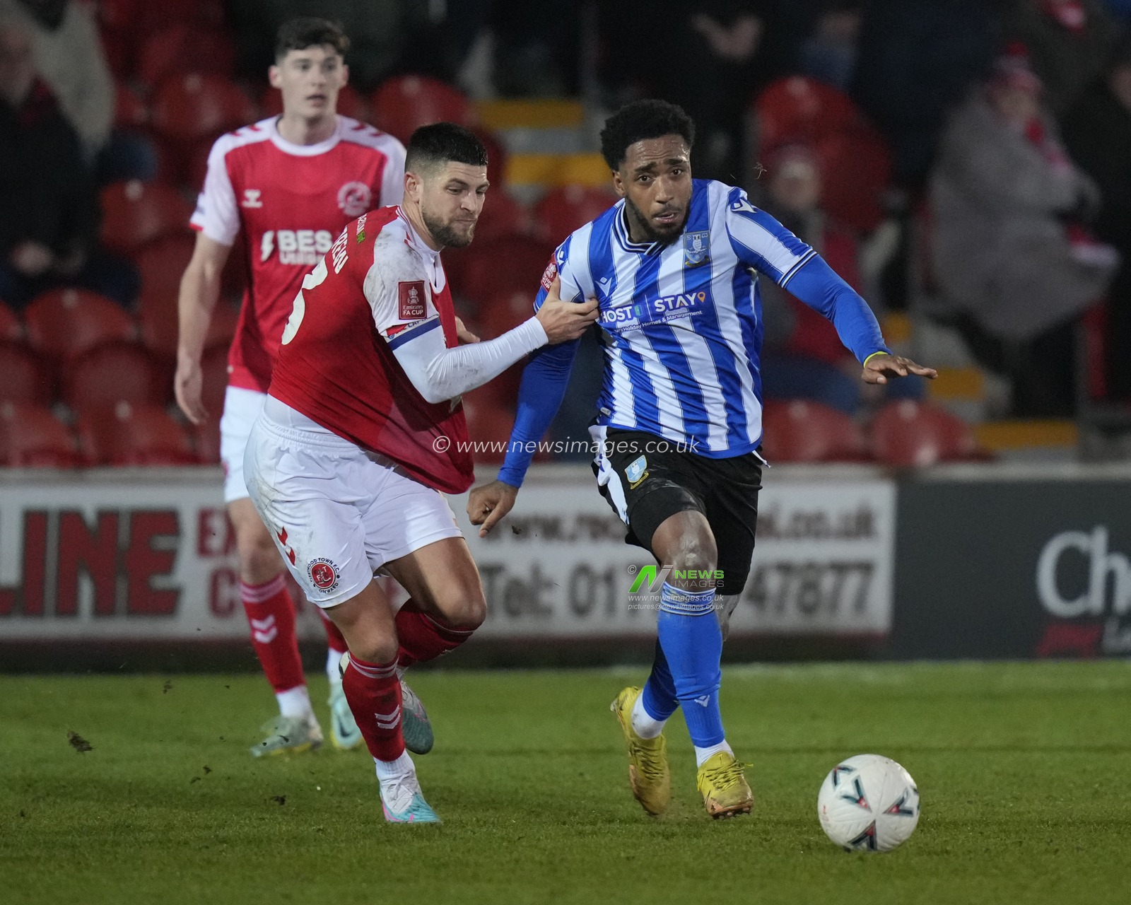 Mallik Wilks #7 of Sheffield Wednesday breaks past Danny Andrew #3 of Fleetwood Town during the Emirates FA Cup Fourth Round Reply match Fleetwood Town vs Sheffield Wednesday at Highbury Stadium, Fleetwood, United Kingdom, 7th February 2023

(Photo by Steve Flynn/News Images)