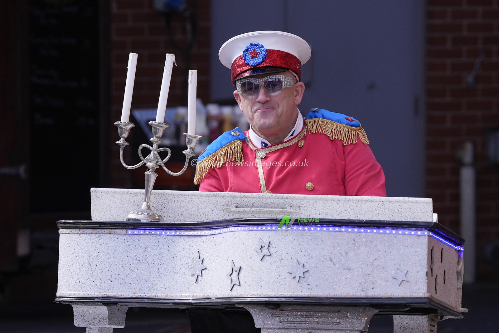 An entertainer dressed as Elton John entertains the fans before the Betfred Super League Round 6 match Leeds Rhinos vs Catalans Dragons at Headingley Stadium, Leeds, United Kingdom, 25th March 2023

(Photo by Steve Flynn/News Images)
