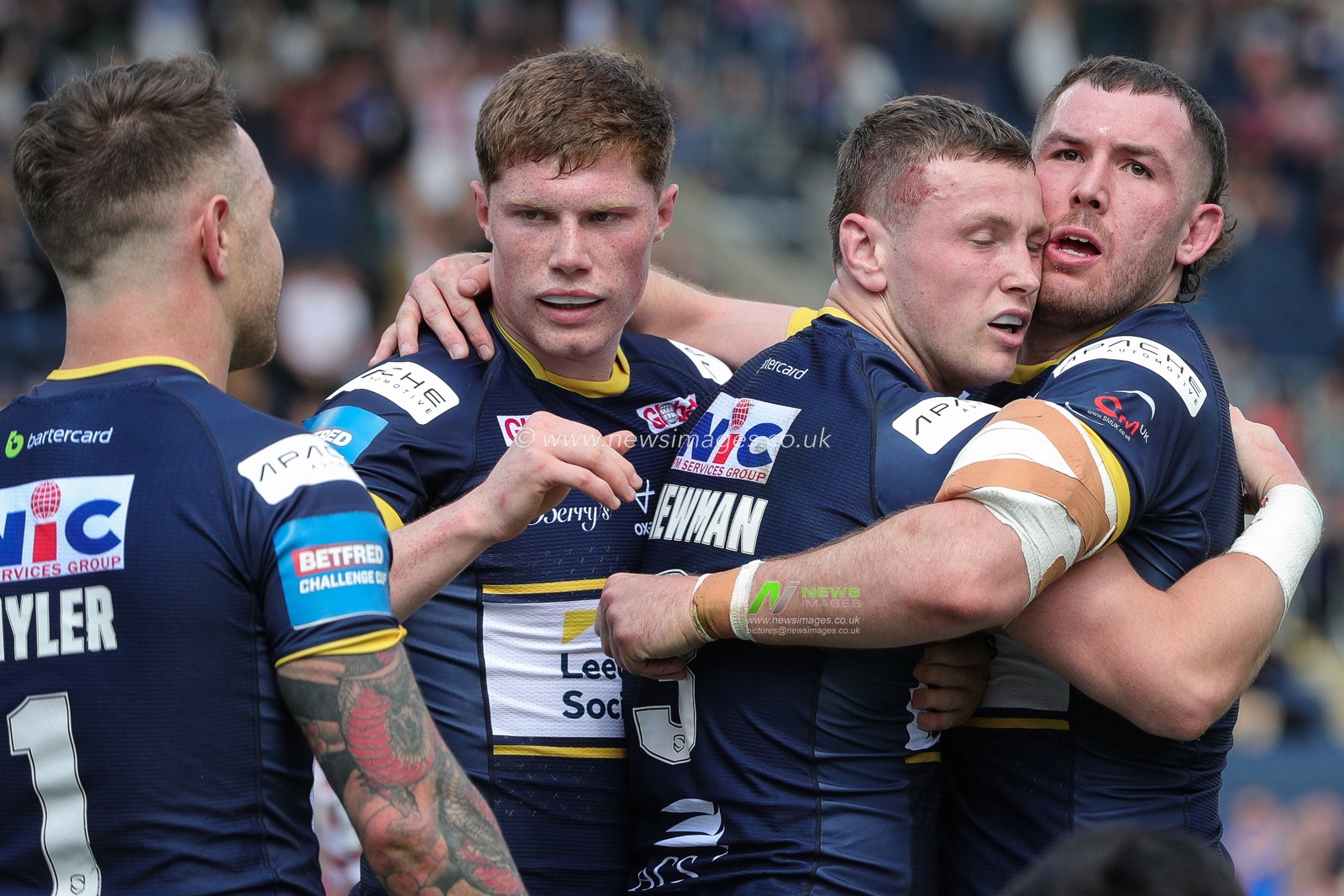 Harry Newman #3 of Leeds Rhinos celebrates his try with his team mates and makes the score 12-0 in the first half of the Betfred Challenge Cup match Leeds Rhinos vs Wigan Warriors at Headingley Stadium, Leeds, United Kingdom, 20th May 2023

(Photo by James Heaton/News Images)