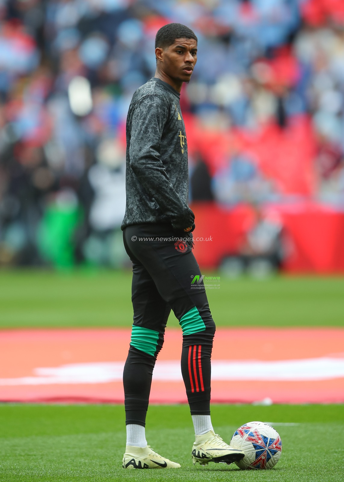 Marcus Rashford of Manchester United warms up ahead of the match, during the Emirates FA Cup Semi-Final match Coventry City vs Manchester United at Wembley Stadium, London, United Kingdom, 21st April 2024

(Photo by Gareth Evans/News Images)