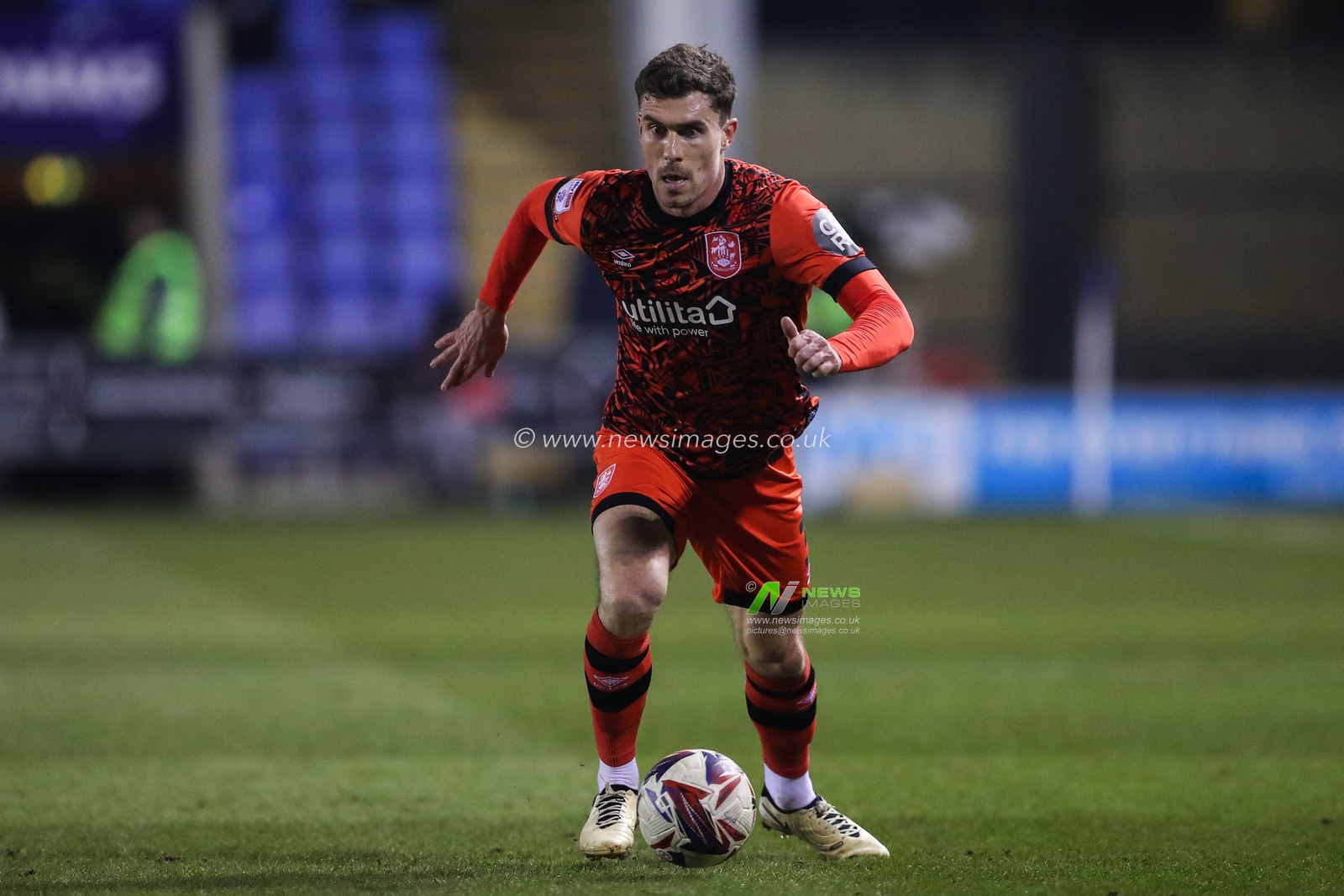 Josh Ruffels of Huddersfield Town goes forward with the ball during the Sky Bet League 1 match Shrewsbury Town vs Huddersfield Town at Croud Meadow, Shrewsbury, United Kingdom, 18th February 2025

(Photo by Gareth Evans/News Images)