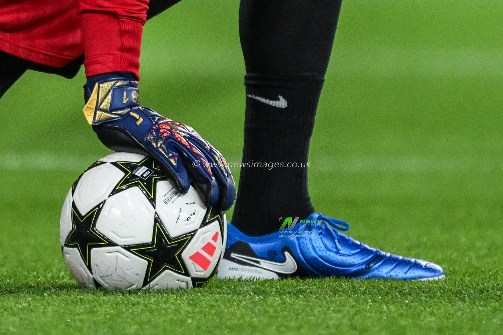 Alisson Becker of Liverpool touches the Champions League ball prior to the UEFA Champions League  - League Stage match Liverpool vs Bologna at Anfield, Liverpool, United Kingdom, 2nd October 2024

(Photo by Craig Thomas/News Images)