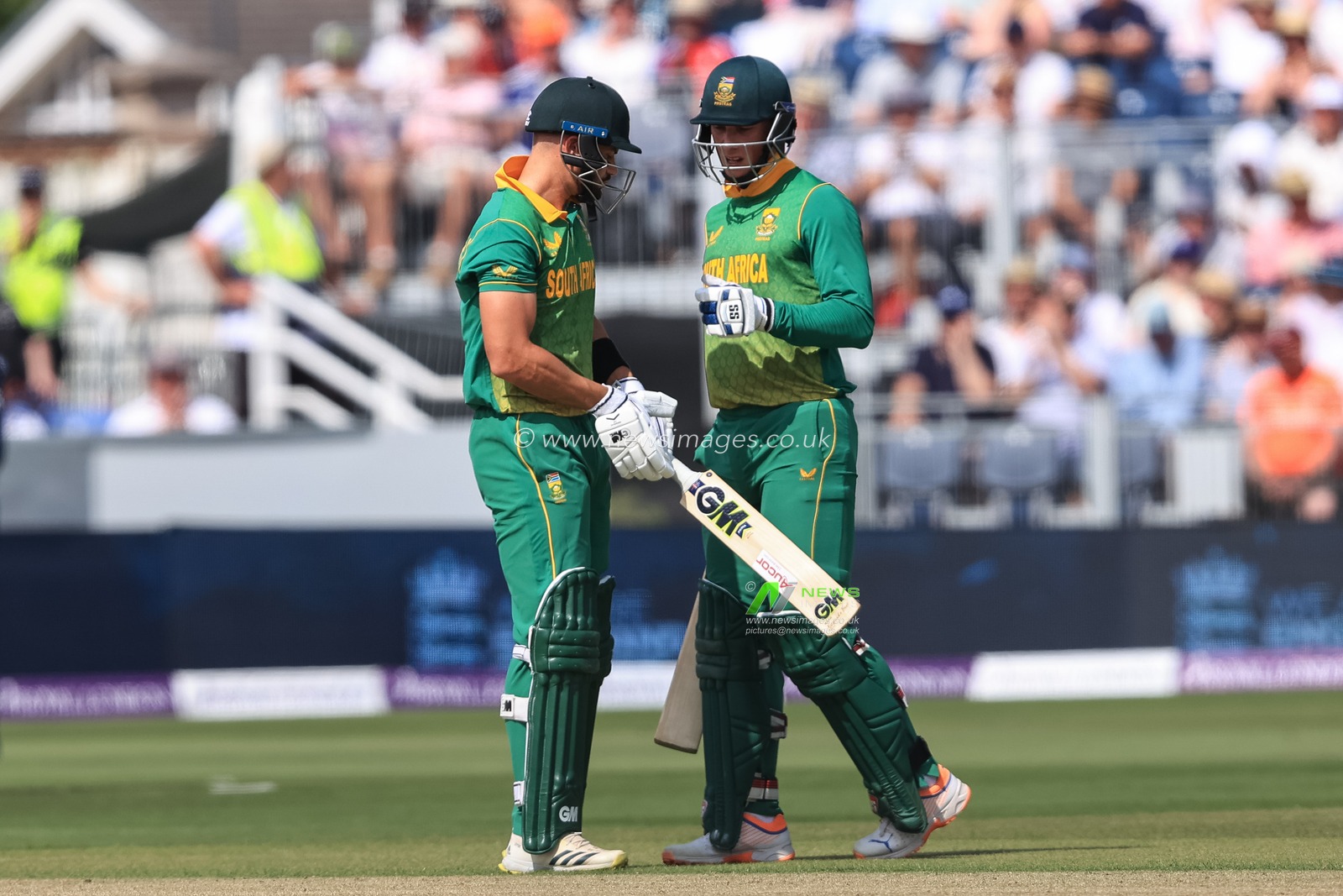 Rassie Van Der Dussen of South Africa congratulates Aiden Markram of South Africa after he hits a boundary