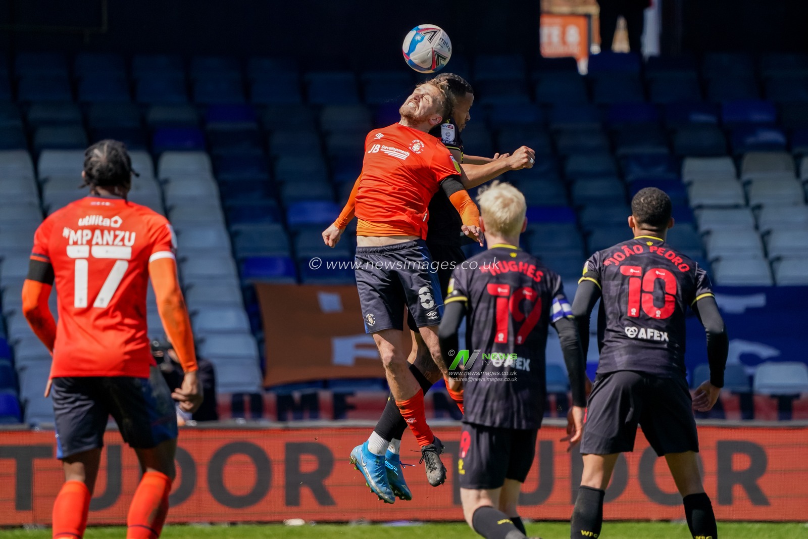 Luke Berry #8 of Luton Town battles with William Troost-Ekong #5 of Watford