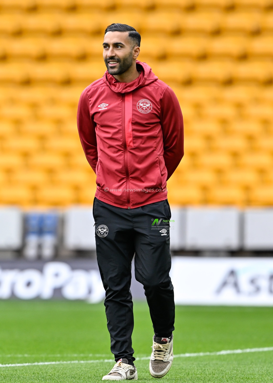 Saman Ghoddos of Brentford all smiles as he inspects the pitch ahead of the match, during the Premier League match Wolverhampton Wanderers vs Brentford at Molineux, Wolverhampton, United Kingdom, 10th February 2024

(Photo by Cody Froggatt/News Images)