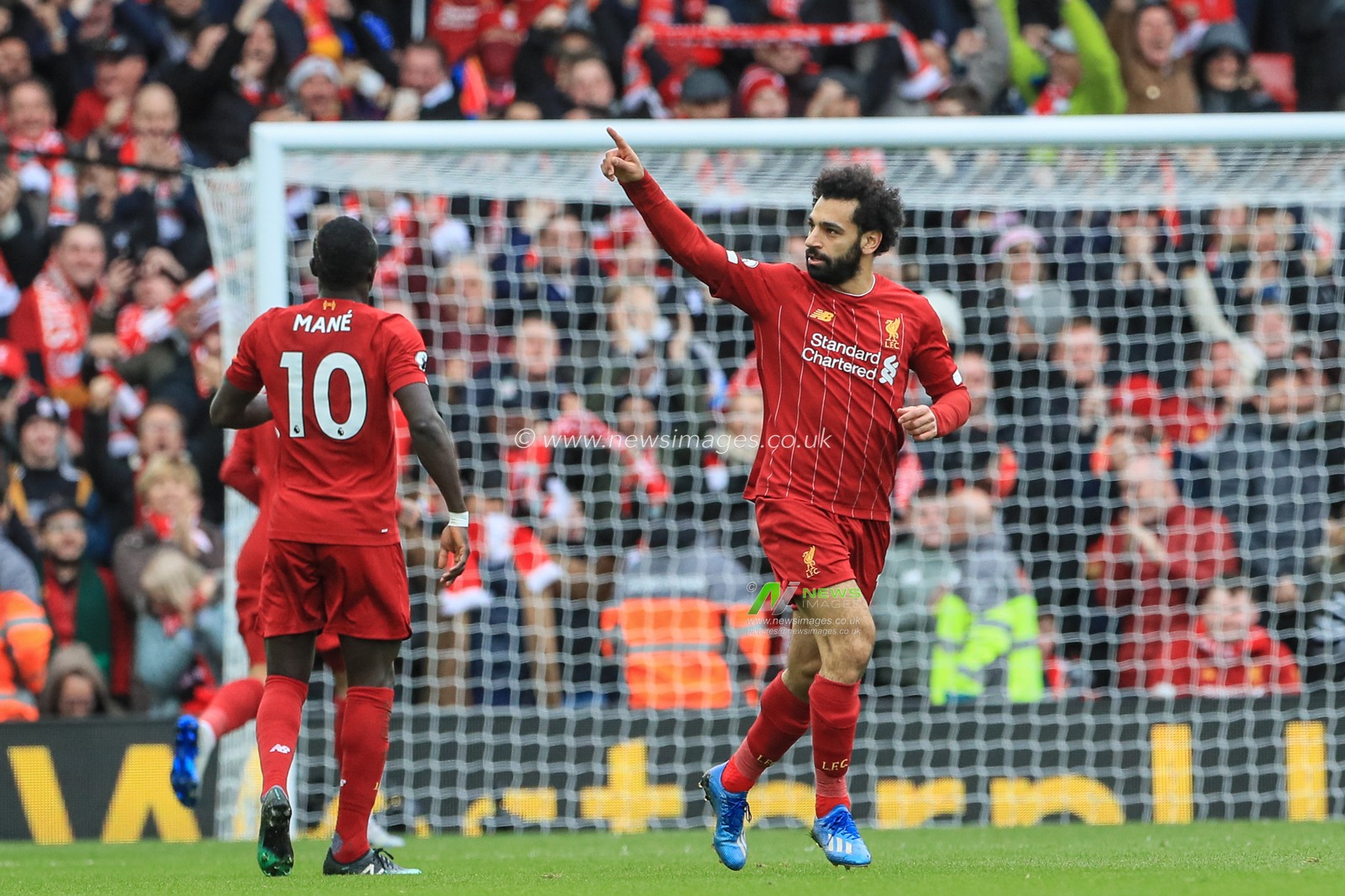 7th March 2020, Anfield, Liverpool, England; Premier League, Liverpool v Bournemouth : Mohamed Salah (11) of Liverpool celebrates his goal to make it 1-1